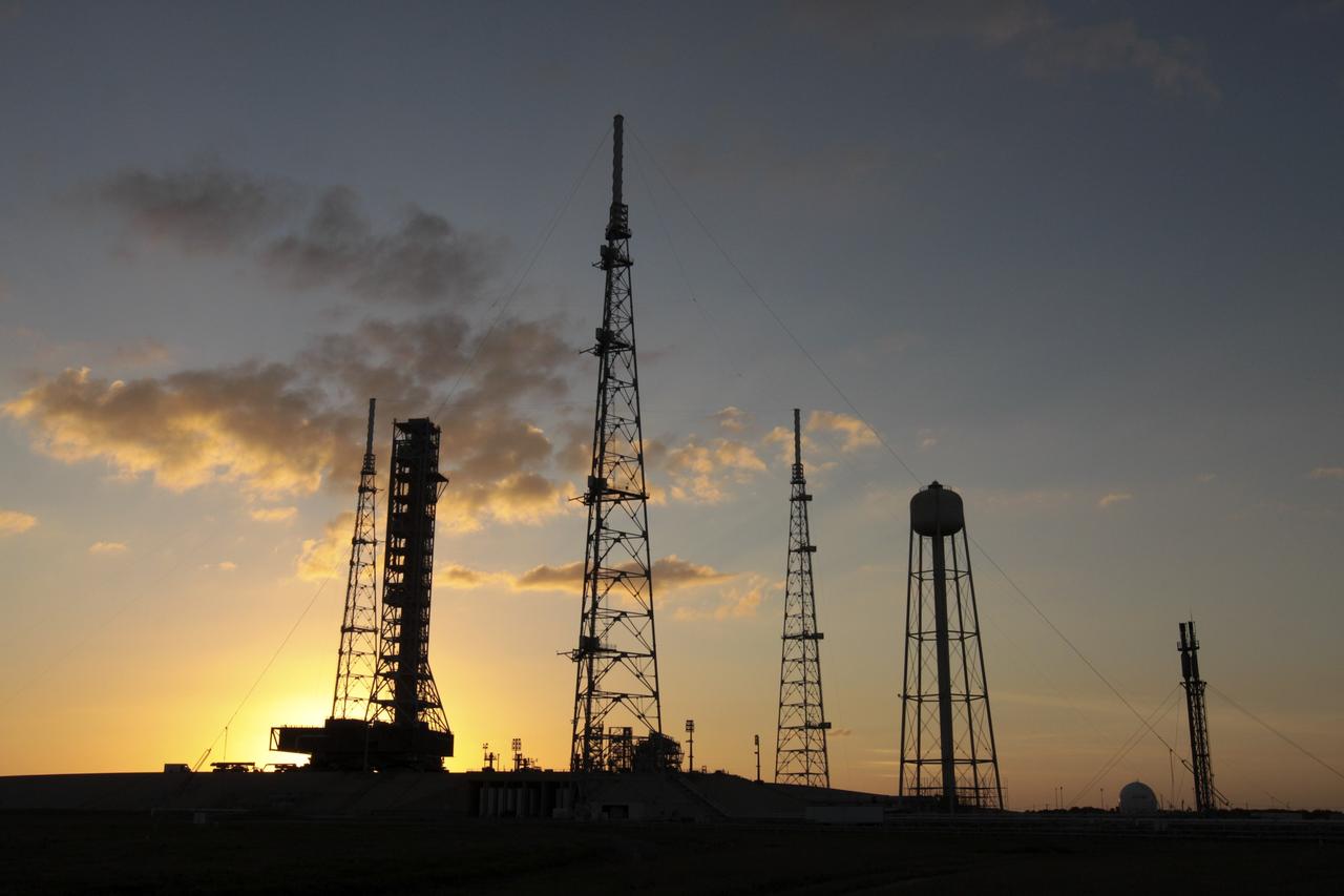 CAPE CANAVERAL, Fla. – With the sun setting in the background at NASA’s Kennedy Space Center in Florida, the mobile launcher (ML) is nearing completion of its 4.2-mile journey to Launch Pad 39B. The ML rolled out aboard a crawler-transporter from next to Kennedy's Vehicle Assembly Building to the pad at about 9:15 a.m. EST. Data on the ML will be collected from structural and functional engineering tests and used for the next phases of construction overseen by NASA’s 21st Century Ground Systems Program. The 355-foot-tall ML structure, which took about two years to construct, is being modified to support NASA’s Space Launch System (SLS), the heavy-lift rocket that will launch astronauts farther into space than ever before. SLS will also create high-quality jobs here at home, and provide the cornerstone for America's future human space exploration efforts. Photo credit: NASA/Kim Shiflett