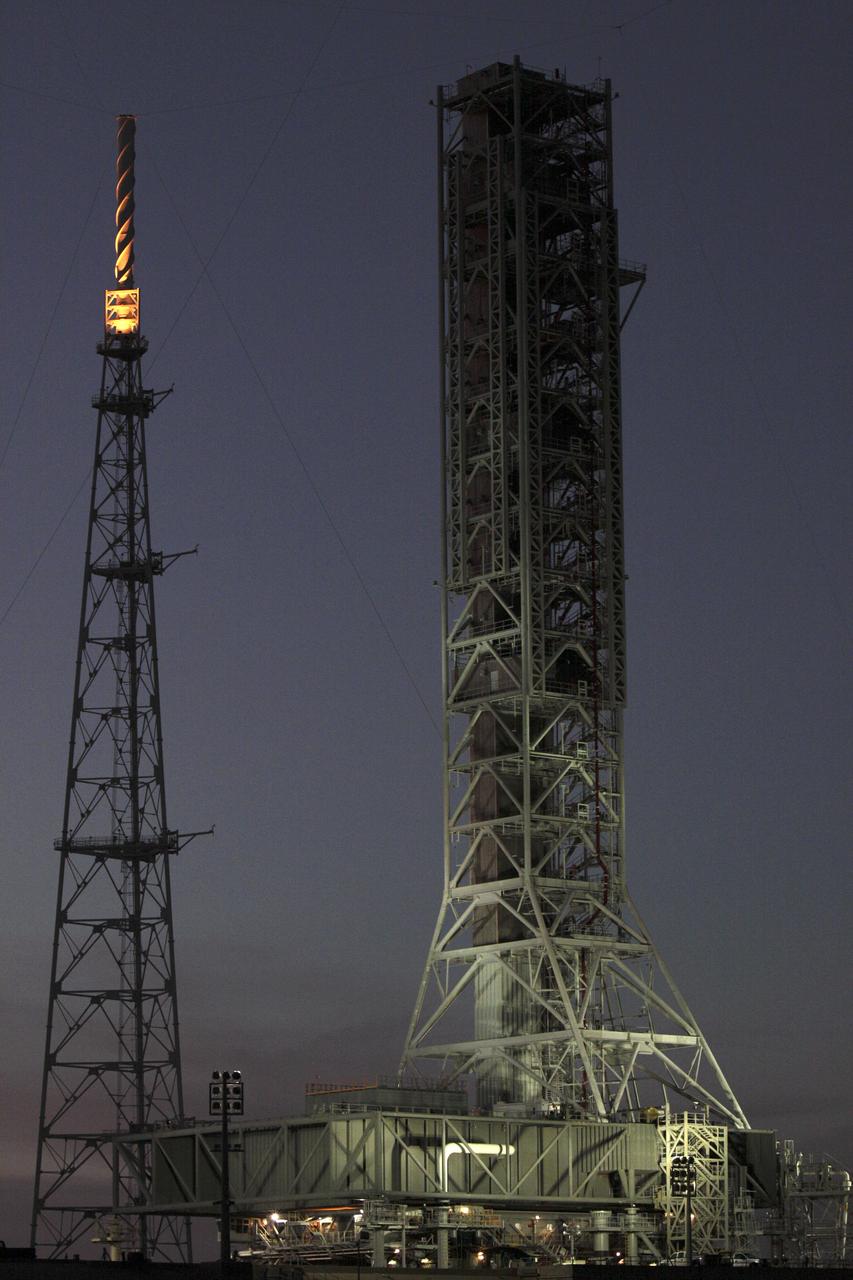 CAPE CANAVERAL, Fla. – At Launch Pad 39B at NASA’s Kennedy Space Center in Florida, the mobile launcher (ML) has completed its 4.2-mile journey. The ML rolled out aboard a crawler-transporter from next to Kennedy's Vehicle Assembly Building to the pad at about 9:15 a.m. EST with the launcher arriving at the pad at 6:29 p.m. Data on the ML will be collected from structural and functional engineering tests and used for the next phases of construction overseen by NASA’s 21st Century Ground Systems Program. The 355-foot-tall ML structure, which took about two years to construct, is being modified to support NASA’s Space Launch System (SLS), the heavy-lift rocket that will launch astronauts farther into space than ever before. SLS will also create high-quality jobs here at home, and provide the cornerstone for America's future human space exploration efforts. Photo credit: NASA/Kim Shiflett
