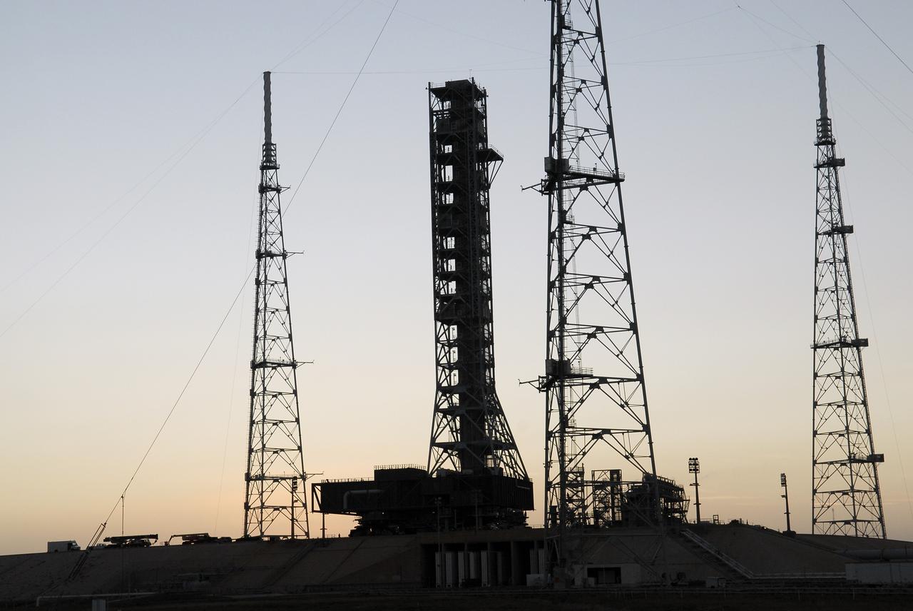 CAPE CANAVERAL, Fla. – With the sun setting in the background at NASA’s Kennedy Space Center in Florida, the mobile launcher (ML) is nearing completion of its 4.2-mile journey to Launch Pad 39B. The launcher rolled out aboard a crawler-transporter from next to Kennedy's Vehicle Assembly Building to the pad at about 9:15 a.m. EST. Data on the ML will be collected from structural and functional engineering tests and used for the next phases of construction overseen by NASA’s 21st Century Ground Systems Program. The 355-foot-tall ML structure, which took about two years to construct, is being modified to support NASA’s Space Launch System (SLS), the heavy-lift rocket that will launch astronauts farther into space than ever before. SLS will also create high-quality jobs here at home, and provide the cornerstone for America's future human space exploration efforts. Photo credit: NASA/Charisse Nahser