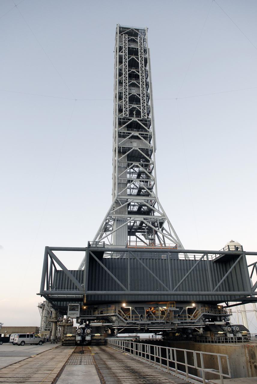 CAPE CANAVERAL, Fla. – At Launch Pad 39B at NASA’s Kennedy Space Center in Florida, the mobile launcher (ML) has completed its 4.2-mile journey. The launcher rolled out aboard a crawler-transporter from next to Kennedy's Vehicle Assembly Building to the pad at about 9:15 a.m. EST with the launcher arriving at the pad at 6:29 p.m. Data on the ML will be collected from structural and functional engineering tests and used for the next phases of construction overseen by NASA’s 21st Century Ground Systems Program. The 355-foot-tall ML structure, which took about two years to construct, is being modified to support NASA’s Space Launch System (SLS), the heavy-lift rocket that will launch astronauts farther into space than ever before. SLS will also create high-quality jobs here at home, and provide the cornerstone for America's future human space exploration efforts. Photo credit: NASA/Charisse Nahser