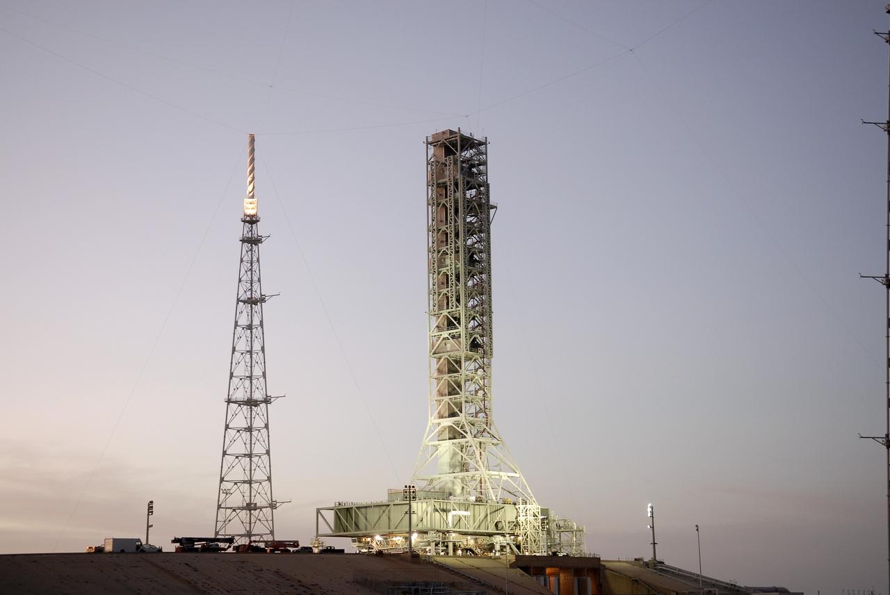 CAPE CANAVERAL, Fla. – At NASA’s Kennedy Space Center in Florida, lights illuminate the mobile launcher (ML) at Launch Pad 39B after completing its 4.2 mile journey to the pad. The launcher rolled out aboard a crawler-transporter from next to Kennedy's Vehicle Assembly Building to the pad at about 9:15 a.m. EST with the launcher arriving at the pad at 6:29 p.m. Data on the ML will be collected from structural and functional engineering tests and used for the next phases of construction overseen by NASA’s 21st Century Ground Systems Program. The 355-foot-tall ML structure, which took about two years to construct, is being modified to support NASA’s Space Launch System (SLS), the heavy-lift rocket that will launch astronauts farther into space than ever before. SLS will also create high-quality jobs here at home, and provide the cornerstone for America's future human space exploration efforts. Photo credit: NASA/Charisse Nahser