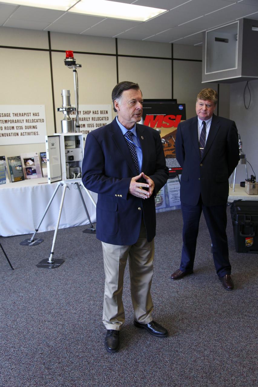 CAPE CANAVERAL, Fla. -- Randy Scott, director of Kennedy Space Center's Radiological Control Center (RADCC), speaks to media during a tour regarding safety equipment and procedures for the upcoming launch of the Mars Science Laboratory (MSL) mission. Behind him is Steve Homann, senior advisor for the Department of Energy.    The MSL spacecraft includes a multi-mission radioisotope thermoelectric generator (MMRTG) that will generate the power needed for the mission from the natural decay of plutonium-238, a non-weapons-grade form of the radioisotope. MSL's components include a car-sized rover, Curiosity, which has 10 science instruments designed to search for signs of life, including methane, and help determine if the gas is from a biological or geological source. Launch of MSL aboard a United Launch Alliance Atlas V rocket is targeted for Nov. 26 from Space Launch Complex 41 on Cape Canaveral Air Force Station. For more information, visit http://www.nasa.gov/msl. Photo credit: NASA/Frankie Martin