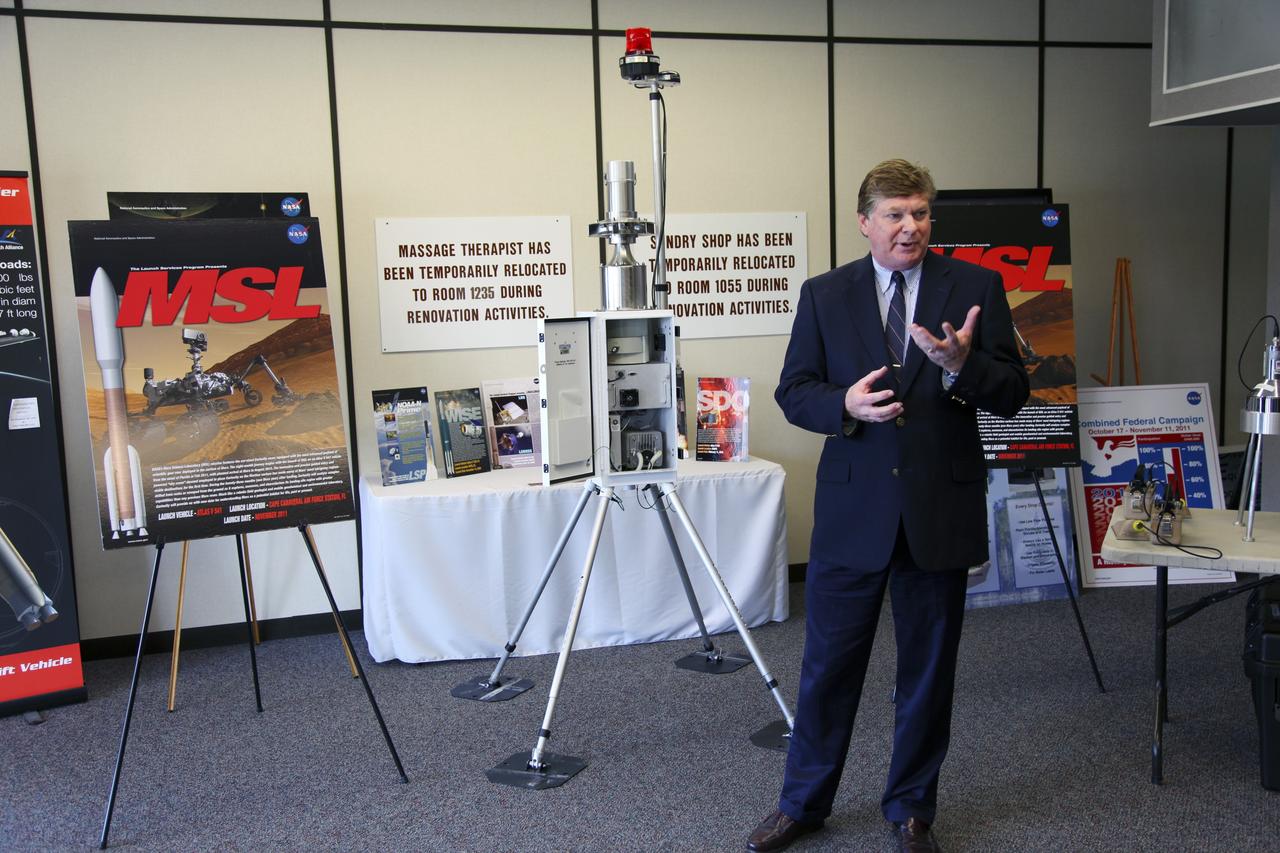 CAPE CANAVERAL, Fla. -- Steve Homann, senior advisor for the Department of Energy, speaks to media during a tour of the Radiological Control Center (RADCC) at NASA's Kennedy Space Center in Florida. The tour focused on safety equipment and procedures for the upcoming launch of the Mars Science Laboratory (MSL) mission.    The MSL spacecraft includes a multi-mission radioisotope thermoelectric generator (MMRTG) that will generate the power needed for the mission from the natural decay of plutonium-238, a non-weapons-grade form of the radioisotope. MSL's components include a car-sized rover, Curiosity, which has 10 science instruments designed to search for signs of life, including methane, and help determine if the gas is from a biological or geological source. Launch of MSL aboard a United Launch Alliance Atlas V rocket is targeted for Nov. 26 from Space Launch Complex 41 on Cape Canaveral Air Force Station. For more information, visit http://www.nasa.gov/msl. Photo credit: NASA/Frankie Martin