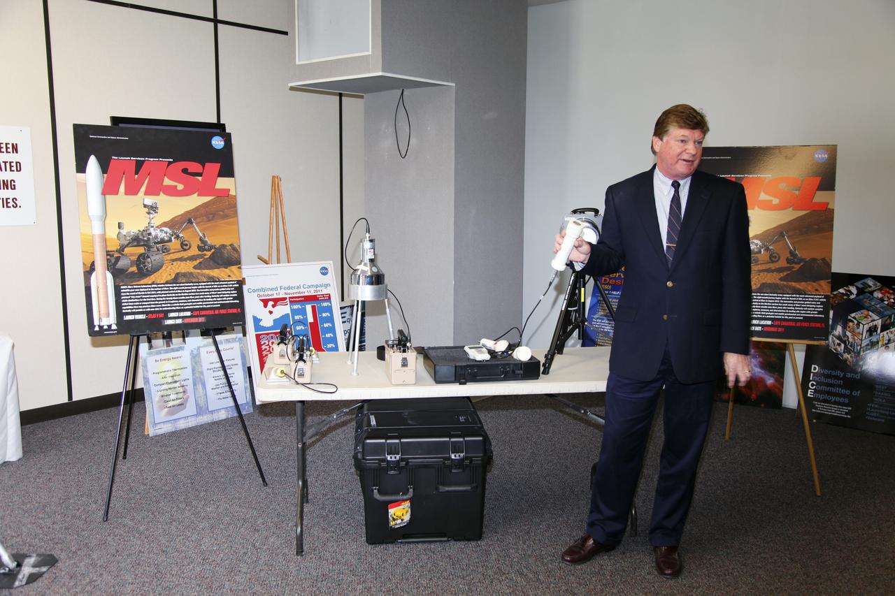 CAPE CANAVERAL, Fla. -- Steve Homann, senior advisor for the Department of Energy, speaks to media during a tour of the Radiological Control Center (RADCC) at NASA's Kennedy Space Center in Florida. The tour focused on safety equipment and procedures for the upcoming launch of the Mars Science Laboratory (MSL) mission.    The MSL spacecraft includes a multi-mission radioisotope thermoelectric generator (MMRTG) that will generate the power needed for the mission from the natural decay of plutonium-238, a non-weapons-grade form of the radioisotope. MSL's components include a car-sized rover, Curiosity, which has 10 science instruments designed to search for signs of life, including methane, and help determine if the gas is from a biological or geological source. Launch of MSL aboard a United Launch Alliance Atlas V rocket is targeted for Nov. 26 from Space Launch Complex 41 on Cape Canaveral Air Force Station. For more information, visit http://www.nasa.gov/msl. Photo credit: NASA/Frankie Martin