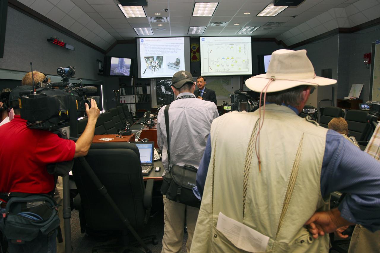 CAPE CANAVERAL, Fla. -- Members of the media view the Radiological Control Center (RADCC) at NASA's Kennedy Space Center in Florida during a tour regarding safety equipment and procedures for the upcoming launch of the Mars Science Laboratory (MSL) mission.    The MSL spacecraft includes a multi-mission radioisotope thermoelectric generator (MMRTG) that will generate the power needed for the mission from the natural decay of plutonium-238, a non-weapons-grade form of the radioisotope. MSL's components include a car-sized rover, Curiosity, which has 10 science instruments designed to search for signs of life, including methane, and help determine if the gas is from a biological or geological source. Launch of MSL aboard a United Launch Alliance Atlas V rocket is targeted for Nov. 26 from Space Launch Complex 41 on Cape Canaveral Air Force Station. For more information, visit http://www.nasa.gov/msl. Photo credit: NASA/Frankie Martin