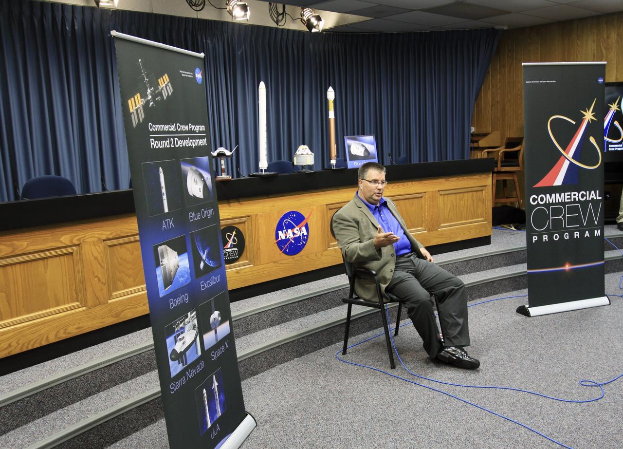 CAPE CANAVERAL, Fla. -- Ed Mango, program manager for NASA's Commercial Crew Program (CCP), updates media on the progress of Commercial Crew Development Round 2 (CCDev2) activities in which seven aerospace companies are maturing launch vehicle and spacecraft systems designed to take astronauts to the International Space Station. The goal of the program is to drive down the cost of space travel as well as open up space to more people than ever before by balancing industry’s own innovative capabilities with NASA's 50 years of human spaceflight experience.    Seven aerospace companies are maturing launch vehicle and spacecraft designs under CCDev2, including Alliant Techsystems Inc. (ATK) of Promontory, Utah, Blue Origin of Kent, Wash., The Boeing Co., of Houston, Excalibur Almaz Inc. of Houston, Sierra Nevada Corp. of Louisville, Colo., Space Exploration Technologies (SpaceX) of Hawthorne, Calif., and United Launch Alliance (ULA) of Centennial, Colo. For more information, visit www.nasa.gov/exploration/commercial Photo credit: Jim Grossmann