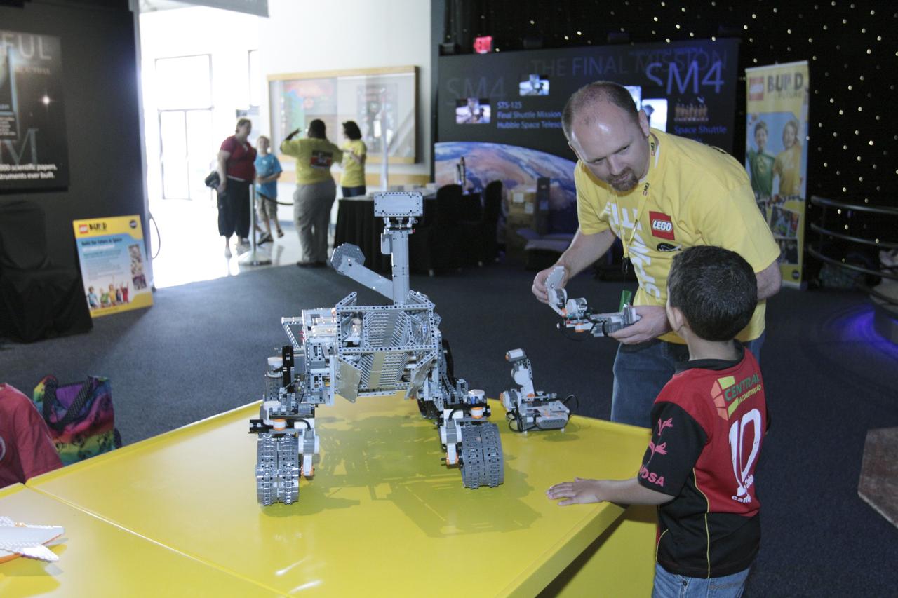 CAPE CANAVERAL, Fla. – LEGO NXT robots, designed to look like Mars rovers, are on display at the LEGO "Build the Future" event at the Kennedy Space Center Visitor Complex in Florida.     The festivities coincide with the launch of NASA's Mars Science Laboratory (MSL), carrying a compact car-sized rover, Curiosity, to the red planet. Part of the Space Act Agreement between NASA and LEGO A/S, the activities are designed to inspire students of every age to consider an education and careers in the science, technology, engineering and mathematics, or STEM, disciplines. Launch of MSL aboard a United Launch Alliance Atlas V rocket is scheduled for Nov. 26 from Space Launch Complex-41 on Cape Canaveral Air Force Station in Florida. For more information, visit http://www.nasa.gov/audience/foreducators/nasa-lego-partnership.html. Photo credit: NASA/Kim Shiflett