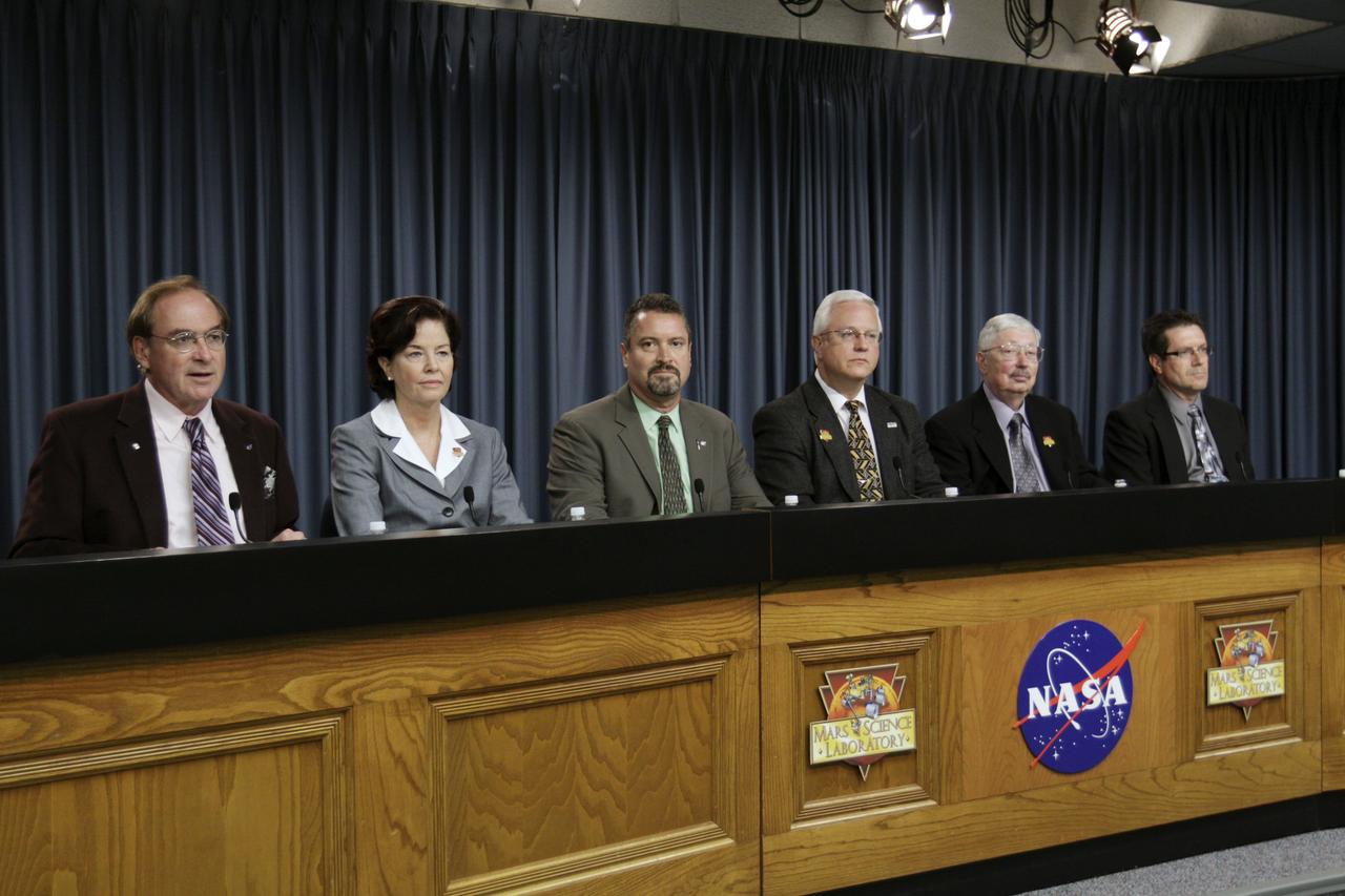 CAPE CANAVERAL, Fla. – NASA’s Kennedy Space Center in Florida is host to a Mars Science Laboratory (MSL) prelaunch news conference as part of preflight activities for the MSL mission. From left are NASA Public Affairs Officer George Diller; Colleen Hartman, assistant associate administrator, NASA Science Mission Directorate; Omar Baez, NASA launch director; Vernon Thorp, program manager, NASA Missions, United Launch Alliance; Peter Theisinger, MSL project manager; and Clay Flinn, launch weather officer 45th Weather Squadron, Cape Canaveral Air Force Station, Fla.    MSL’s components include a car-sized rover, Curiosity, which has 10 science instruments designed to search for signs of life, including methane, and help determine if the gas is from a biological or geological source. Launch of MSL aboard a United Launch Alliance Atlas V rocket is scheduled for Nov. 26 from Space Launch Complex-41 on Cape Canaveral Air Force Station in Florida. For more information, visit http://www.nasa.gov/msl. Photo credit: NASA/Kim Shiflett
