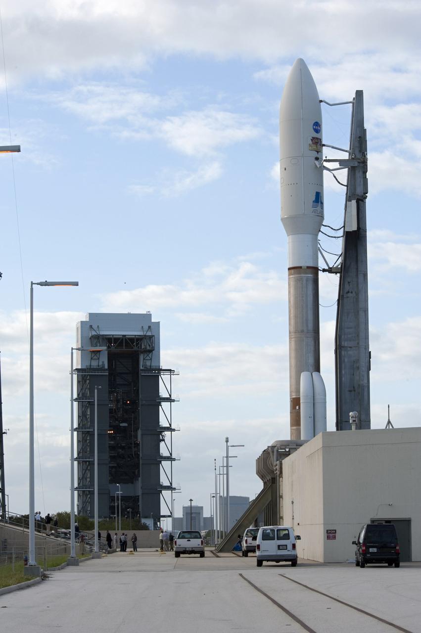 CAPE CANAVERAL, Fla. -- On Cape Canaveral Air Force Station in Florida, the 197-foot-tall United Launch Alliance Atlas V rocket rolls from the Vertical Integration Facility (VIF) at Space Launch Complex-41, in the background, to the launch pad. Atop the rocket is NASA's Mars Science Laboratory (MSL), enclosed in its payload fairing. The rocket began its move from the VIF at 8 a.m. EST. Liftoff is planned during a launch window which extends from 10:02 a.m. to 11:45 a.m. EST on Nov. 26. MSL's components include a car-sized rover, Curiosity, which has 10 science instruments designed to search for signs of life, including methane, and help determine if the gas is from a biological or geological source. For more information, visit http://www.nasa.gov/msl. Photo credit: NASA/Tony Gray