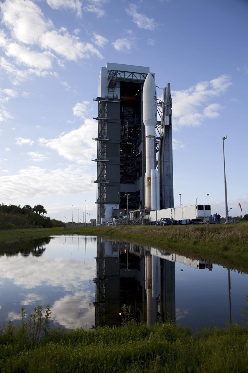 CAPE CANAVERAL, Fla. -- On Cape Canaveral Air Force Station in Florida, the 197-foot-tall United Launch Alliance Atlas V rocket moves away from the Vertical Integration Facility (VIF) during the vehicle's rollout to the launch pad at Space Launch Complex 41. Atop the rocket is NASA's Mars Science Laboratory (MSL), enclosed in its payload fairing. The rocket began its move from the VIF at 8 a.m. EST and arrived at the pad at 8:40 a.m.    Liftoff is planned during a launch window which extends from 10:02 a.m. to 11:45 a.m. EST on Nov. 26. MSL's components include a car-sized rover, Curiosity, which has 10 science instruments designed to search for signs of life, including methane, and help determine if the gas is from a biological or geological source. For more information, visit http://www.nasa.gov/msl. Photo credit: NASA/Frankie Martin
