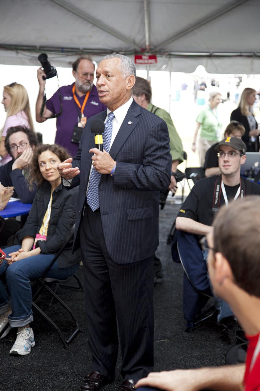 CAPE CANAVERAL, Fla. – NASA Administrator Charles Bolden addresses the participants of a NASA Tweetup in a tent set up at NASA Kennedy Space Center's Press Site in Florida during prelaunch activities for the agency’s Mars Science Laboratory (MSL) launch. Participants in the Tweetup are given the opportunity to listen to agency briefings, tour locations on the center normally off limits to visitors, and get a close-up view of Space Launch Complex-41 on Cape Canaveral Air Force Station. The tweeters will share their experiences with followers through the social networking site Twitter. The MSL mission will pioneer precision landing technology and a sky-crane touchdown to place a car-sized rover, Curiosity, near the foot of a mountain inside Gale Crater on Aug. 6, 2012. During a nearly two-year prime mission after landing, the rover will investigate whether the region has ever offered conditions favorable for microbial life, including the chemical ingredients for life. Liftoff of MSL aboard a United Launch Alliance Atlas V rocket from pad 41 is planned during a launch window which extends from 10:02 a.m. to 11:45 a.m. EST on Nov. 26. For more information, visit http://www.nasa.gov/msl. Photo credit: NASA/Frankie Martin