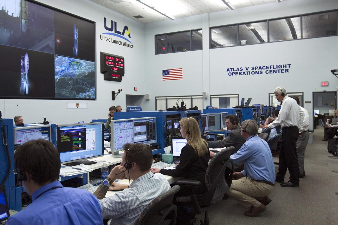 CAPE CANAVERAL – Launch controllers oversee the countdown in the Atlas V Spaceflight Operations Center (ASOC) before the launch of the Mars Science Laboratory on an Atlas V rocket. MSL lifted off at 10:02 a.m. EST Nov. 26, beginning a 9-month interplanetary cruise to Mars. MSL's components include a car-sized rover, Curiosity, which has 10 science instruments designed to search for signs of life, including methane, and help determine if the gas is from a biological or geological source. For more information, visit http://www.nasa.gov/msl. Photo credit: NASA/Kim Shiflett