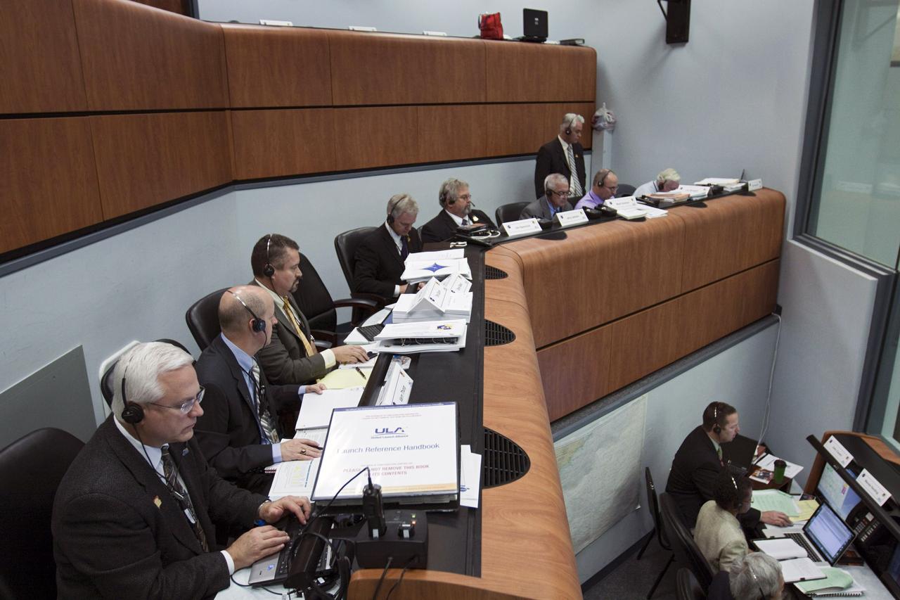 CAPE CANAVERAL – Launch managers from NASA and United Launch Alliance oversee the countdown in the Atlas V Spaceflight Operations Center (ASOC) before the launch of the Mars Science Laboratory on an Atlas V rocket. MSL lifted off at 10:02 a.m. EST Nov. 26, beginning a 9-month interplanetary cruise to Mars. MSL's components include a car-sized rover, Curiosity, which has 10 science instruments designed to search for signs of life, including methane, and help determine if the gas is from a biological or geological source. For more information, visit http://www.nasa.gov/msl. Photo credit: NASA/Kim Shiflett