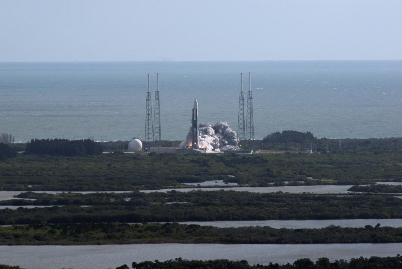 CAPE CANAVERAL, Fla. – The Atlantic Ocean provides a backdrop as NASA's Mars Science Laboratory (MSL) spacecraft, sealed inside its payload fairing, launches atop a United Launch Alliance Atlas V rocket. MSL lifted off from Space Launch Complex 41 on Cape Canaveral Air Force Station in Florida at 10:02 a.m. EST Nov. 26, beginning a 9-month interplanetary cruise to Mars. MSL's components include a car-sized rover, Curiosity, which has 10 science instruments designed to search for signs of life, including methane, and help determine if the gas is from a biological or geological source. For more information, visit http://www.nasa.gov/msl. Photo credit: NASA/Darrell L. McCall