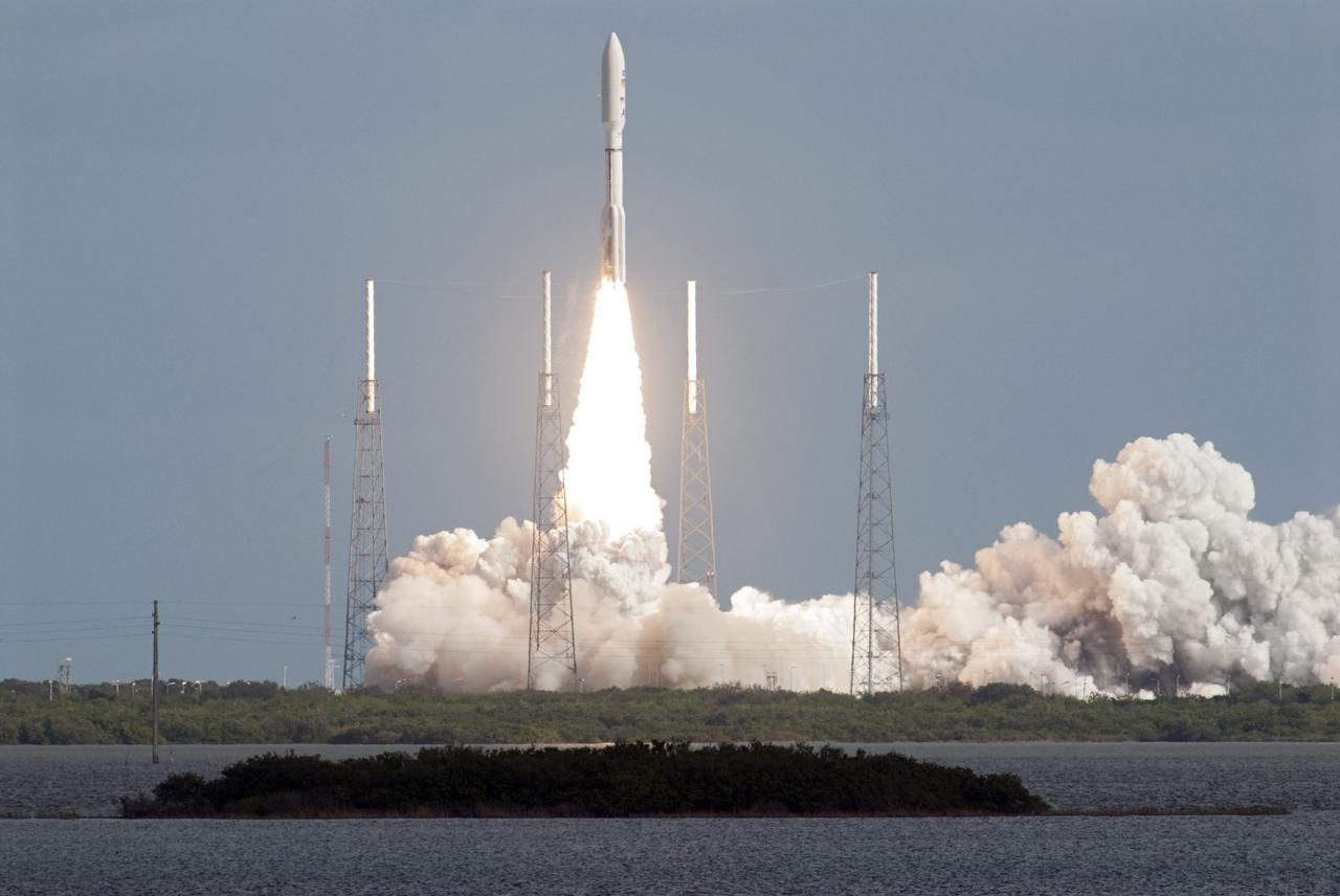 CAPE CANAVERAL, Fla. – NASA's Mars Science Laboratory (MSL) spacecraft, sealed inside its payload fairing atop the United Launch Alliance Atlas V rocket, clears the tower at Space Launch Complex 41 on Cape Canaveral Air Force Station in Florida. MSL lifted off from at 10:02 a.m. EST Nov. 26, beginning a 9-month interplanetary cruise to Mars. MSL's components include a car-sized rover, Curiosity, which has 10 science instruments designed to search for signs of life, including methane, and help determine if the gas is from a biological or geological source. For more information, visit http://www.nasa.gov/msl. Photo credit: NASA/Bill White