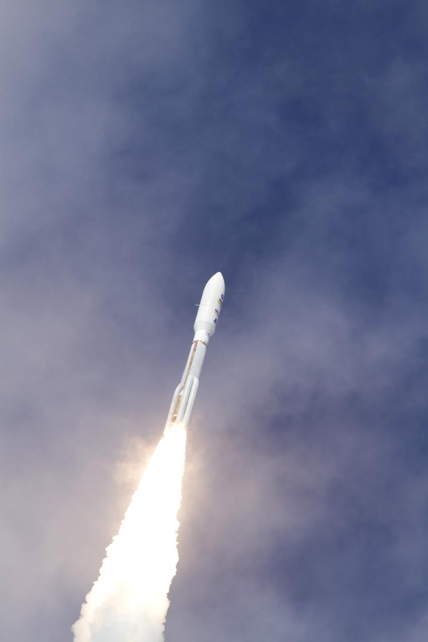 CAPE CANAVERAL, Fla. -- With NASA's Mars Science Laboratory (MSL) spacecraft sealed inside its payload fairing, the United Launch Alliance Atlas V rocket rides a plume of flames as it climbs into the blue sky over Space Launch Complex-41 on Cape Canaveral Air Force Station in Florida at 10:02 a.m. EST Nov. 26. MSL's components include a car-sized rover, Curiosity, which has 10 science instruments designed to search for signs of life, including methane, and help determine if the gas is from a biological or geological source. For more information, visit http://www.nasa.gov/msl. Photo credit: NASA/George Roberts