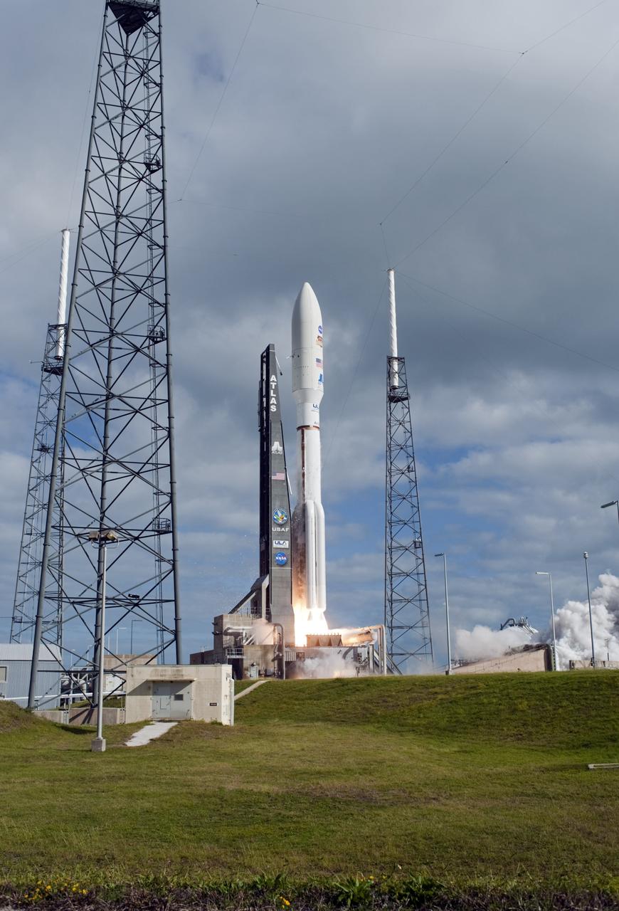 CAPE CANAVERAL, Fla. -- With NASA's Mars Science Laboratory (MSL) spacecraft sealed inside its payload fairing, the United Launch Alliance Atlas V rocket begins to liftoff from Space Launch Complex-41 on Cape Canaveral Air Force Station in Florida at 10:02 a.m. EST Nov. 26. MSL's components include a car-sized rover, Curiosity, which has 10 science instruments designed to search for signs of life, including methane, and help determine if the gas is from a biological or geological source. For more information, visit http://www.nasa.gov/msl. Photo credit: NASA/Tony Gray and Rick Wetherington