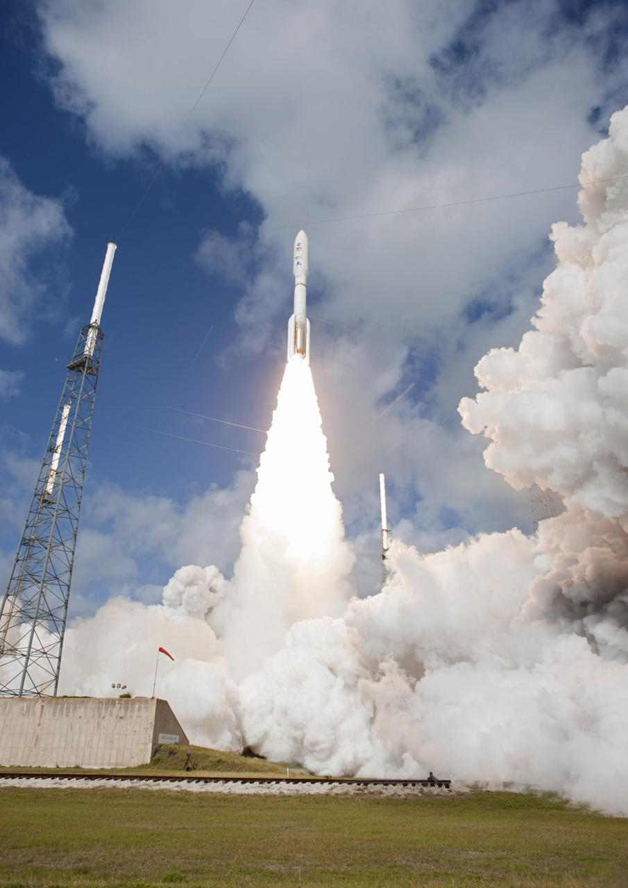 CAPE CANAVERAL, Fla. -- The United Launch Alliance Atlas V rocket carrying NASA's Mars Science Laboratory (MSL) spacecraft rides a plume of flames as it lifts off from Space Launch Complex-41 at Cape Canaveral Air Force Station in Florida at 10:02 a.m. EST Nov. 26. MSL's components include a car-sized rover, Curiosity, which has 10 science instruments designed to search for signs of life, including methane, and help determine if the gas is from a biological or geological source. For more information, visit http://www.nasa.gov/msl. Photo credit: NASA/Tony Gray and Rick Wetherington