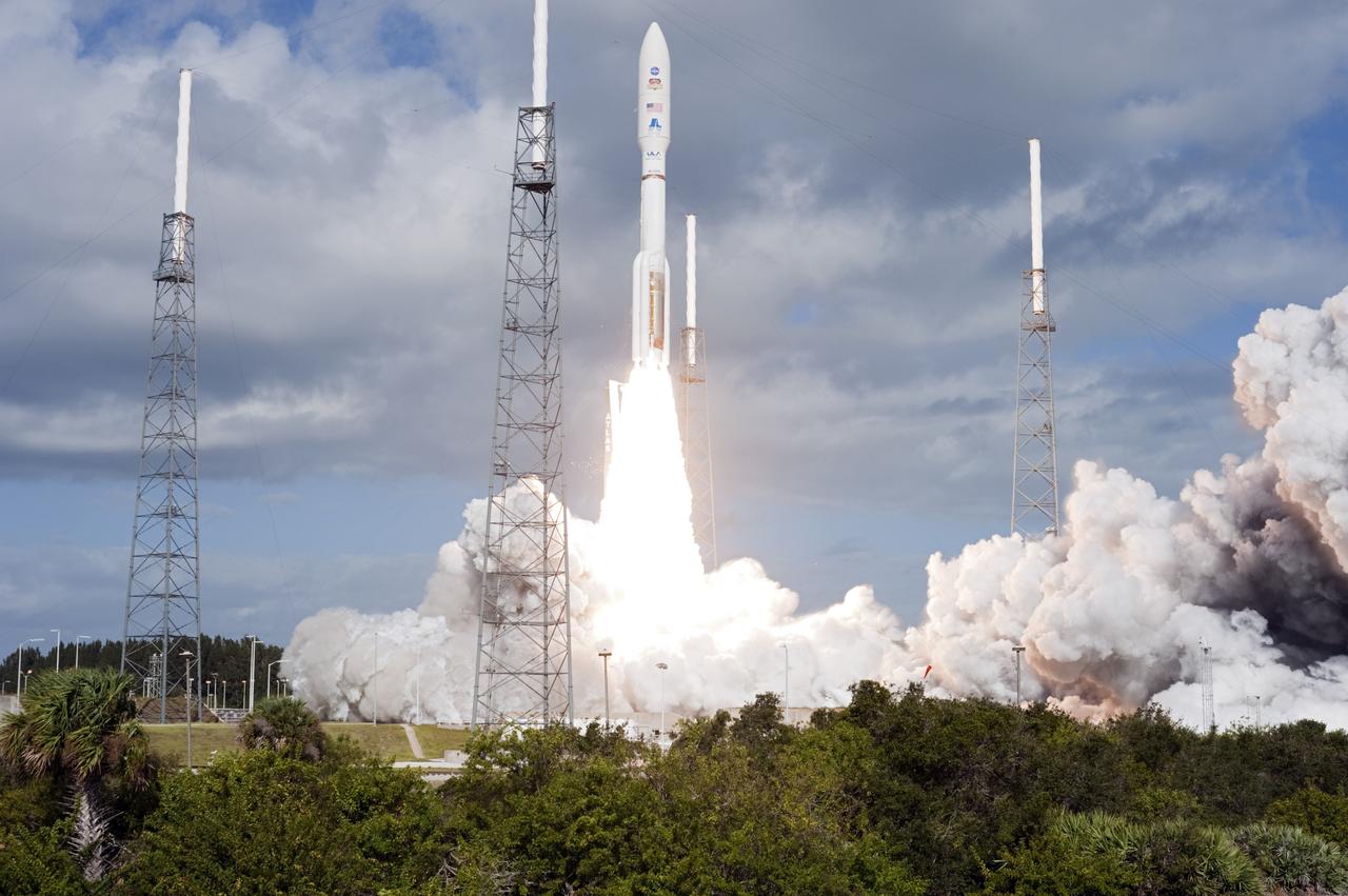 CAPE CANAVERAL, Fla. -- The United Launch Alliance Atlas V rocket carrying NASA's Mars Science Laboratory (MSL) spacecraft rides a plume of flames as it clears the tower at Space Launch Complex-41 at Cape Canaveral Air Force Station in Florida at 10:02 a.m. EST Nov. 26. MSL's components include a car-sized rover, Curiosity, which has 10 science instruments designed to search for signs of life, including methane, and help determine if the gas is from a biological or geological source. For more information, visit http://www.nasa.gov/msl. Photo credit: NASA/Tony Gray and Rick Wetherington