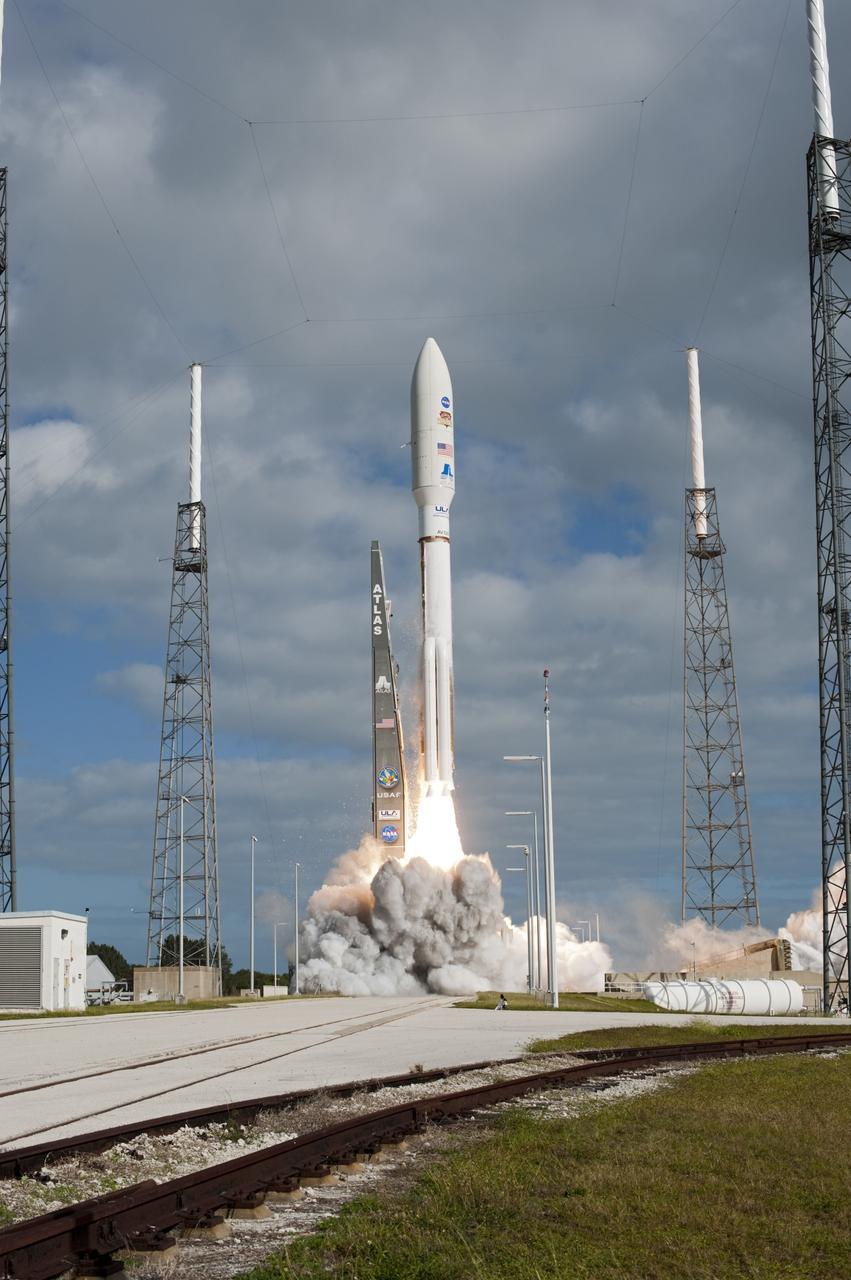 CAPE CANAVERAL, Fla. -- With NASA's Mars Science Laboratory (MSL) spacecraft sealed inside its payload fairing, the United Launch Alliance Atlas V rocket begins to liftoff from Space Launch Complex-41 on Cape Canaveral Air Force Station in Florida at 10:02 a.m. EST Nov. 26. MSL's components include a car-sized rover, Curiosity, which has 10 science instruments designed to search for signs of life, including methane, and help determine if the gas is from a biological or geological source. For more information, visit http://www.nasa.gov/msl. Photo credit: NASA/Tony Gray and Rick Wetherington