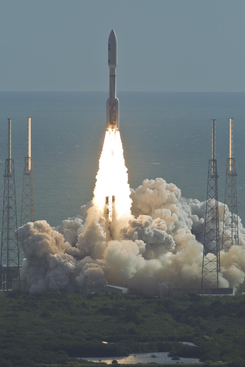 With NASA's Mars Science Laboratory (MSL) spacecraft sealed inside its payload fairing, the United Launch Alliance Atlas V rocket rides smoke and flames as it rises from the launch pad at Space Launch Complex-41 on Cape Canaveral Air Force Station in Florida at 10:02 a.m. EST Nov. 26. MSL's components include a car-sized rover, Curiosity, which has 10 science instruments designed to search for signs of life, including methane, and help determine if the gas is from a biological or geological source. For more information, visit http://www.nasa.gov/msl. Courtesy: Scott Andrews/Canon