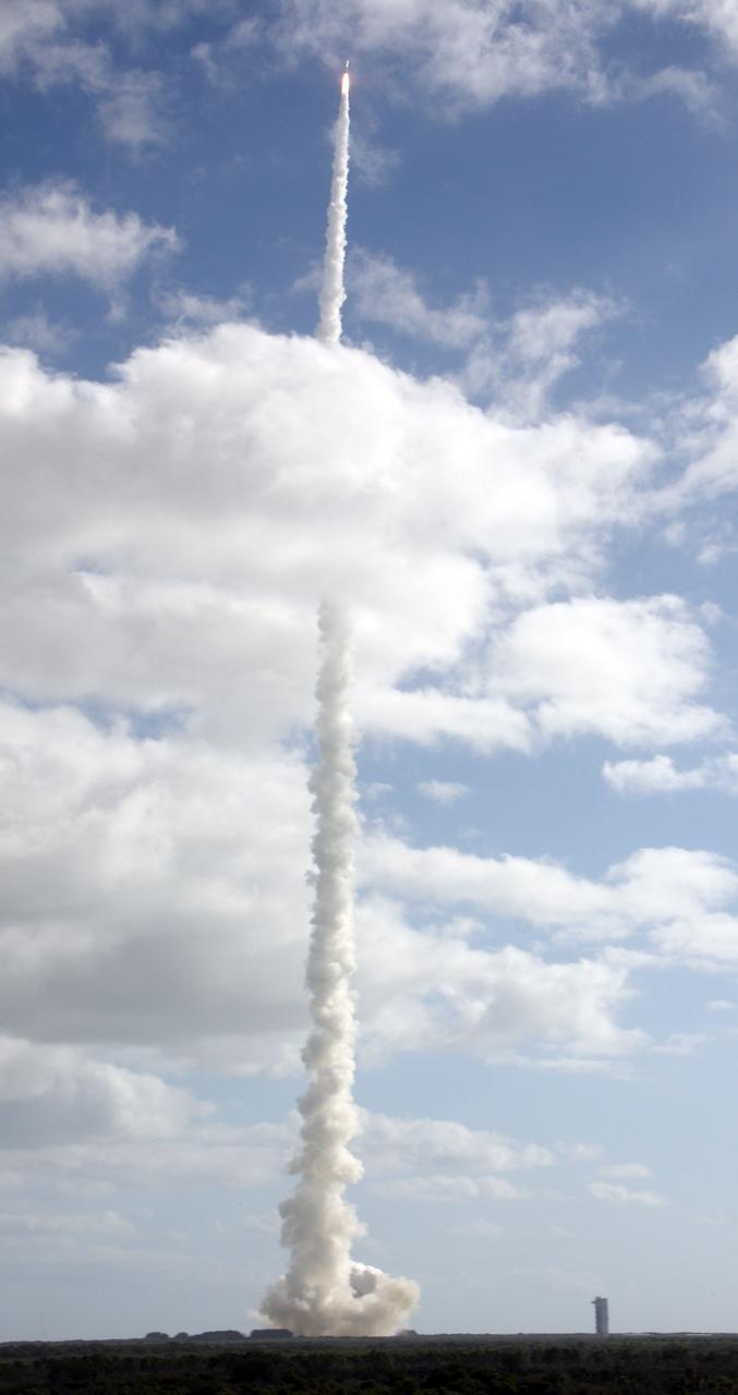 CAPE CANAVERAL, Fla. -- With NASA's Mars Science Laboratory (MSL) spacecraft sealed inside its payload fairing, the United Launch Alliance Atlas V rocket rides a tall pillar of smoke and flames as it soars over Space Launch Complex-41 on Cape Canaveral Air Force Station in Florida, after liftoff at 10:02 a.m. EST Nov. 26.            MSL's components include a car-sized rover, Curiosity, which has 10 science instruments designed to search for signs of life, including methane, and help determine if the gas is from a biological or geological source. For more information, visit http://www.nasa.gov/msl. Photo credit: NASA/Ken Thornsley