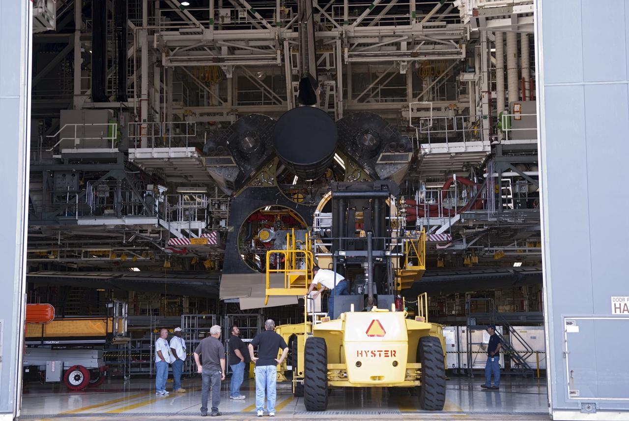 CAPE CANAVERAL, Fla. – A replica shuttle main engine (RSME) arrives in Orbiter Processing Facility-1 at NASA’s Kennedy Space Center in Florida where it will be installed on space shuttle Discovery. The RSME was built in the Pratt & Whitney Rocketdyne engine shop at Kennedy. The RSME is one of three that will be installed on Discovery during Space Shuttle Program transition and retirement activities. Discovery is being prepared for display at the Smithsonian’s National Air and Space Museum Steven F. Udvar-Hazy Center in Chantilly, Va. For more information, visit http://www.nasa.gov/shuttle. Photo credit: NASA/Jim Grossmann