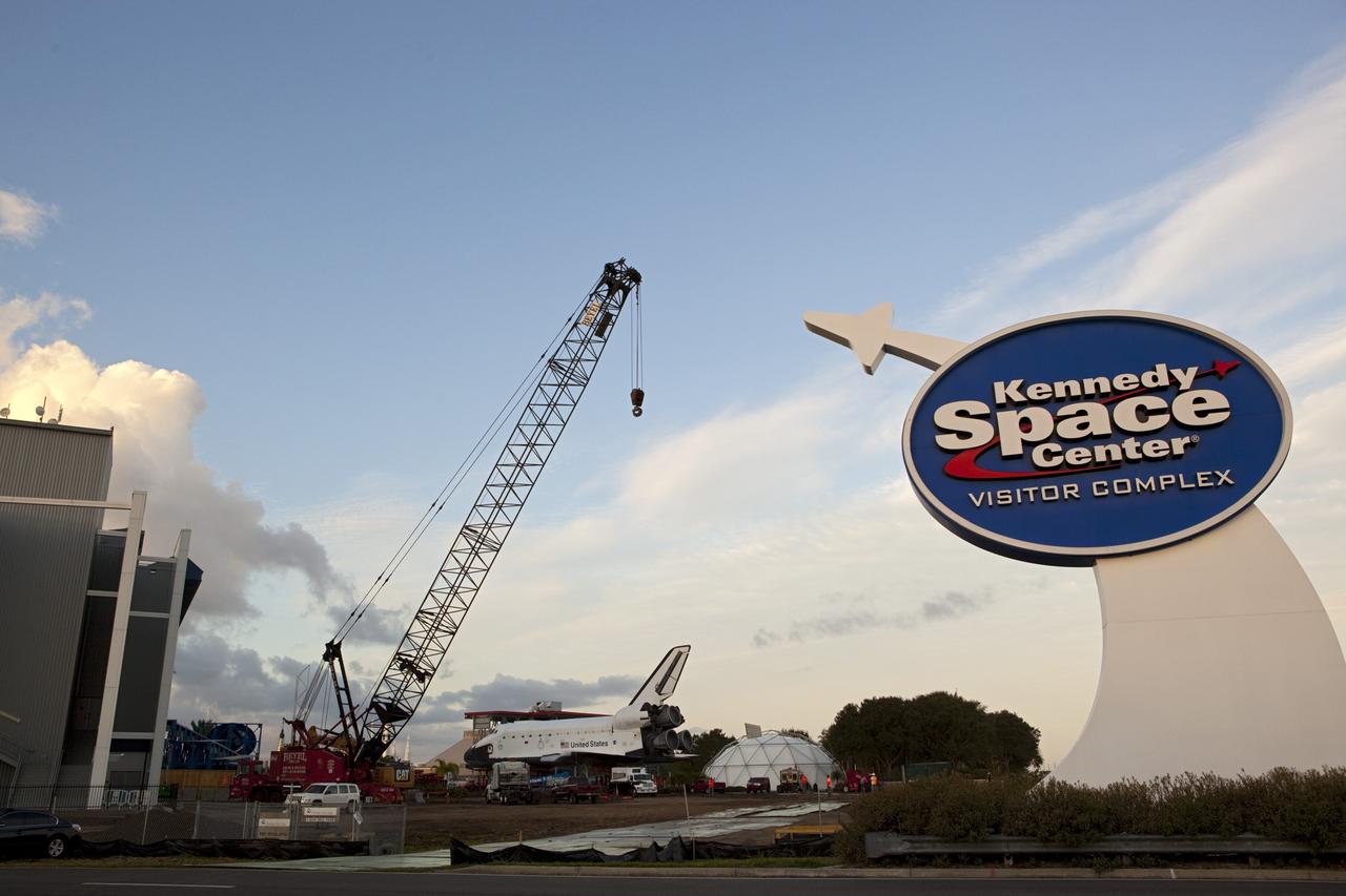 CAPE CANAVERAL, Fla. – Daybreak at the Kennedy Space Center Visitor Complex in Florida finds preparations under way to move the high-fidelity space shuttle model to NASA Kennedy Space Center's Launch Complex 39 turn basin.  The shuttle was part of a display at the visitor complex that also included an external tank and two solid rocket boosters that were used to show visitors the size of actual space shuttle components. The full-scale shuttle model is being transferred from Kennedy to Space Center Houston, NASA Johnson Space Center's visitor center. The model will stay at the turn basin for a few months until it is ready to be transported to Texas via barge. The move also helps clear the way for the Kennedy Space Center Visitor Complex to begin construction of a new facility next year to display space shuttle Atlantis in 2013.  For more information about Space Center Houston, visit http://www.spacecenter.org.  Photo credit: NASA/Dimitri Gerondidakis