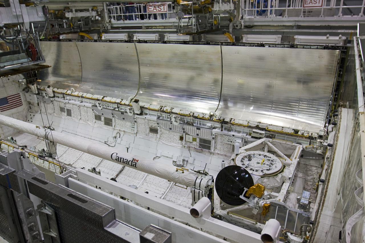CAPE CANAVERAL, Fla. – In Orbiter Processing Facility-1 at NASA's Kennedy Space Center in Florida, preparations are under way to close space shuttle Discovery’s payload bay doors for the final time during Space Shuttle Program transition and retirement activities. Following the door closure, the vehicle will be powered down for the last time. Discovery is being prepared for public display at the Smithsonian’s National Air and Space Museum Steven F. Udvar-Hazy Center in Chantilly, Va., in 2012. For more information, visit http://www.nasa.gov/shuttle. Photo credit: NASA/Kim Shiflett
