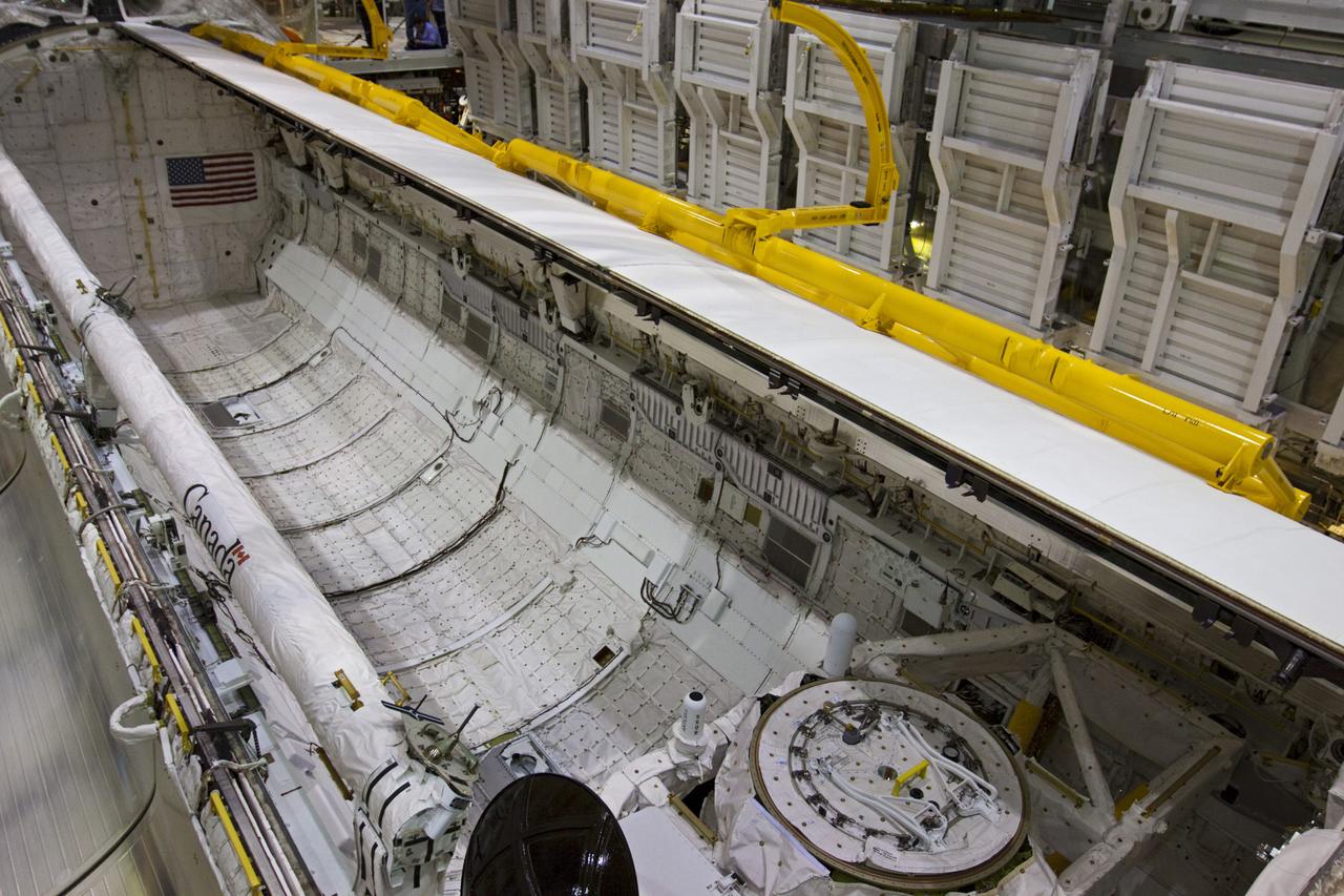 CAPE CANAVERAL, Fla. – In Orbiter Processing Facility-1 at NASA's Kennedy Space Center in Florida, the camera captures a last look at space shuttle Discovery’s payload bay before its payload bay doors are closed for the final time during Space Shuttle Program transition and retirement activities. Following the door closure, the vehicle will be powered down for the last time. Discovery is being prepared for public display at the Smithsonian’s National Air and Space Museum Steven F. Udvar-Hazy Center in Chantilly, Va., in 2012. For more information, visit http://www.nasa.gov/shuttle. Photo credit: NASA/Kim Shiflett