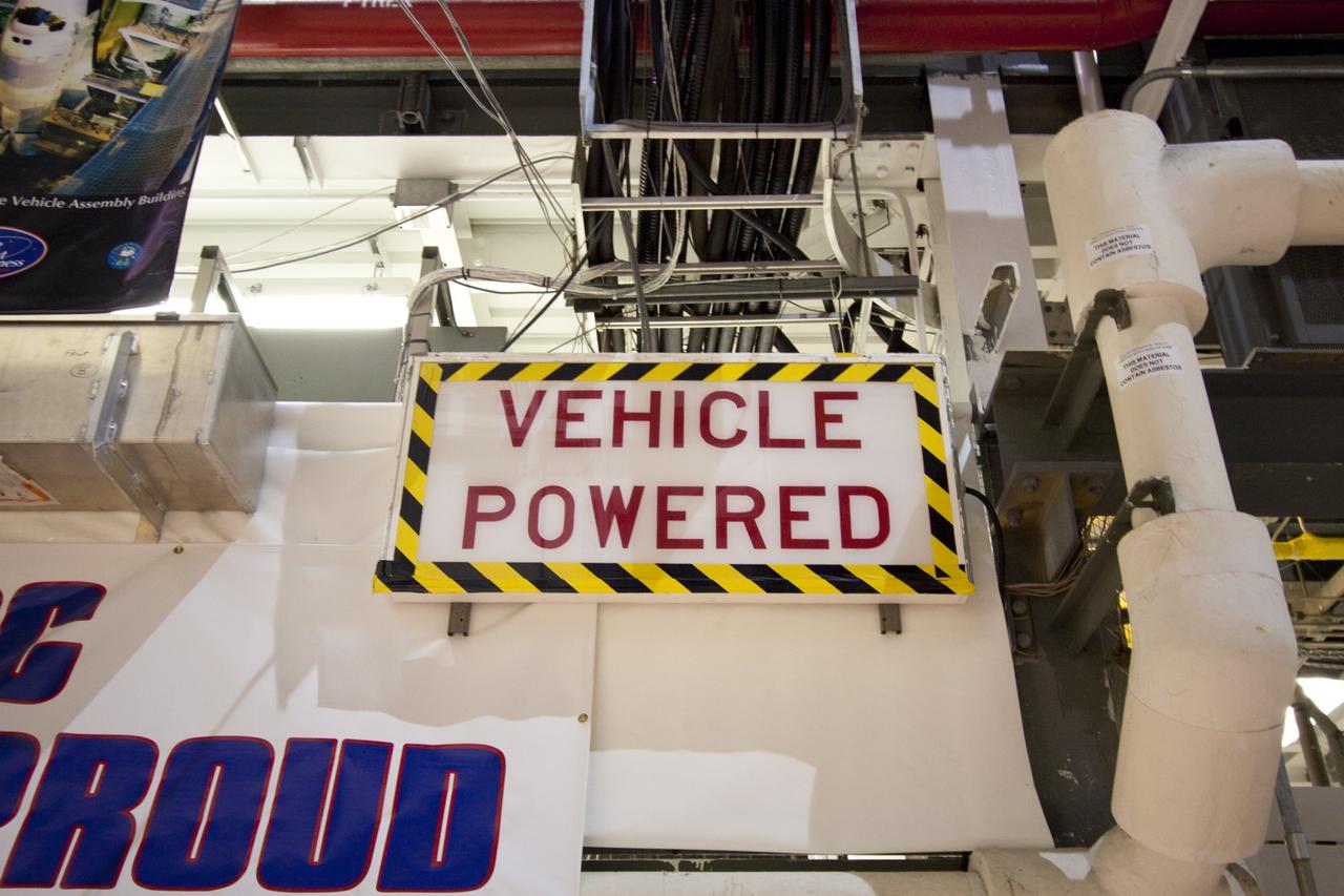 CAPE CANAVERAL, Fla. – In Orbiter Processing Facility-1 at NASA's Kennedy Space Center in Florida, the "vehicle powered" sign is turned off following the final power down of space shuttle Discovery during Space Shuttle Program transition and retirement activities. "Power down" followed the final closure of Discovery's payload bay doors. Discovery is being prepared for public display at the Smithsonian’s National Air and Space Museum Steven F. Udvar-Hazy Center in Chantilly, Va., in 2012. For more information, visit http://www.nasa.gov/shuttle. Photo credit: NASA/Jim Grossmann