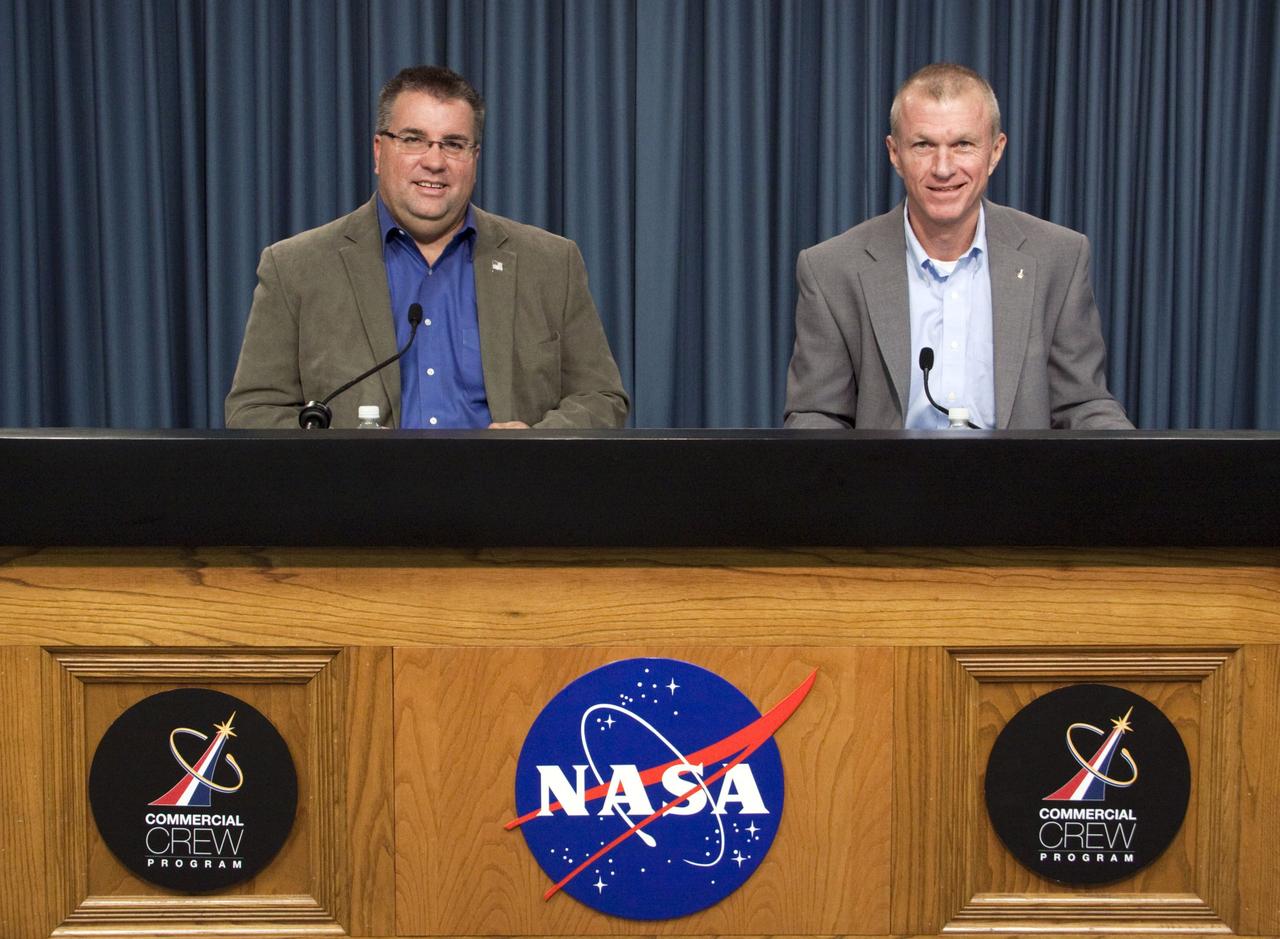 CAPE CANAVERAL, Fla. -- Commercial Crew Program (CCP) Manager Ed Mango, left, and Deputy Program Manager Brent Jett host a Program Strategy Forum at NASA's Kennedy Space Center in Florida. The forum was held to update industry partners about NASA's decision to use multiple, competitively awarded Space Act Agreements (SAAs) instead of an Integrated Design Contract for the agency's next phase of developing commercial space transportation system capabilities. Using SAAs instead of a contract will allow NASA to maintain multiple partners, with the flexibility to adjust technical direction, milestones and funding. The move was made so the program could adapt to dynamic budgetary circumstances while maintaining a high level of competition among transportation providers.    CCP is helping to mature the design and development of a crew transportation system with the overall goal of accelerating a United States-led capability to the International Space Station. The goal of the program is to drive down the cost of space travel as well as open up space to more people than ever before by balancing industry’s own innovative capabilities with NASA's 50 years of human spaceflight experience. For more information, visit www.nasa.gov/commercialcrew. Photo credit: NASA/Jim Grossmann