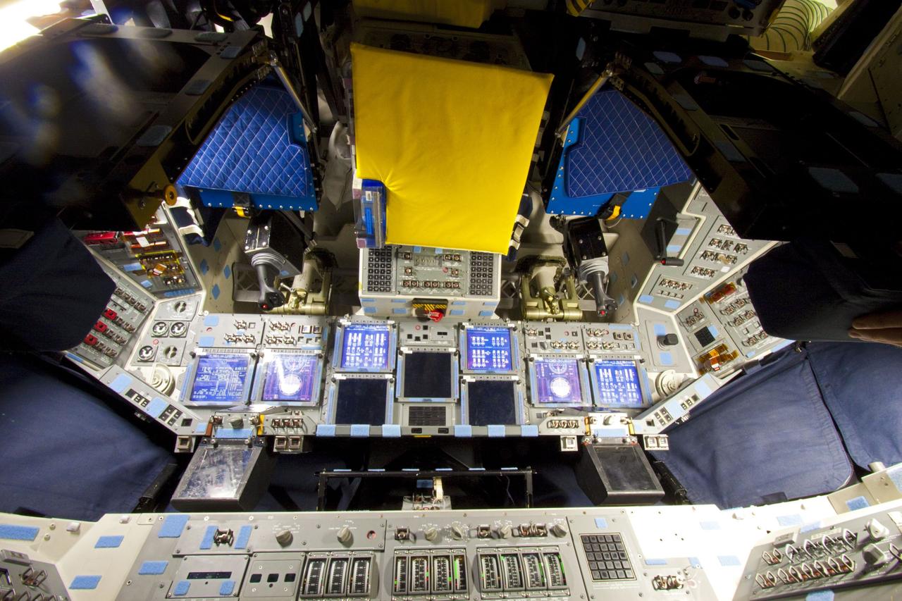 CAPE CANAVERAL, Fla. – In Orbiter Processing Facility-2 at NASA's Kennedy Space Center in Florida, the flight deck of space shuttle Atlantis is brightly lit one last time as preparations are made for the shuttle's final power down during Space Shuttle Program transition and retirement activities. Atlantis is being prepared for public display in 2013 at the Kennedy Space Center Visitor Complex.  For more information, visit http://www.nasa.gov/shuttle.  Photo credit: NASA/Jim Grossmann