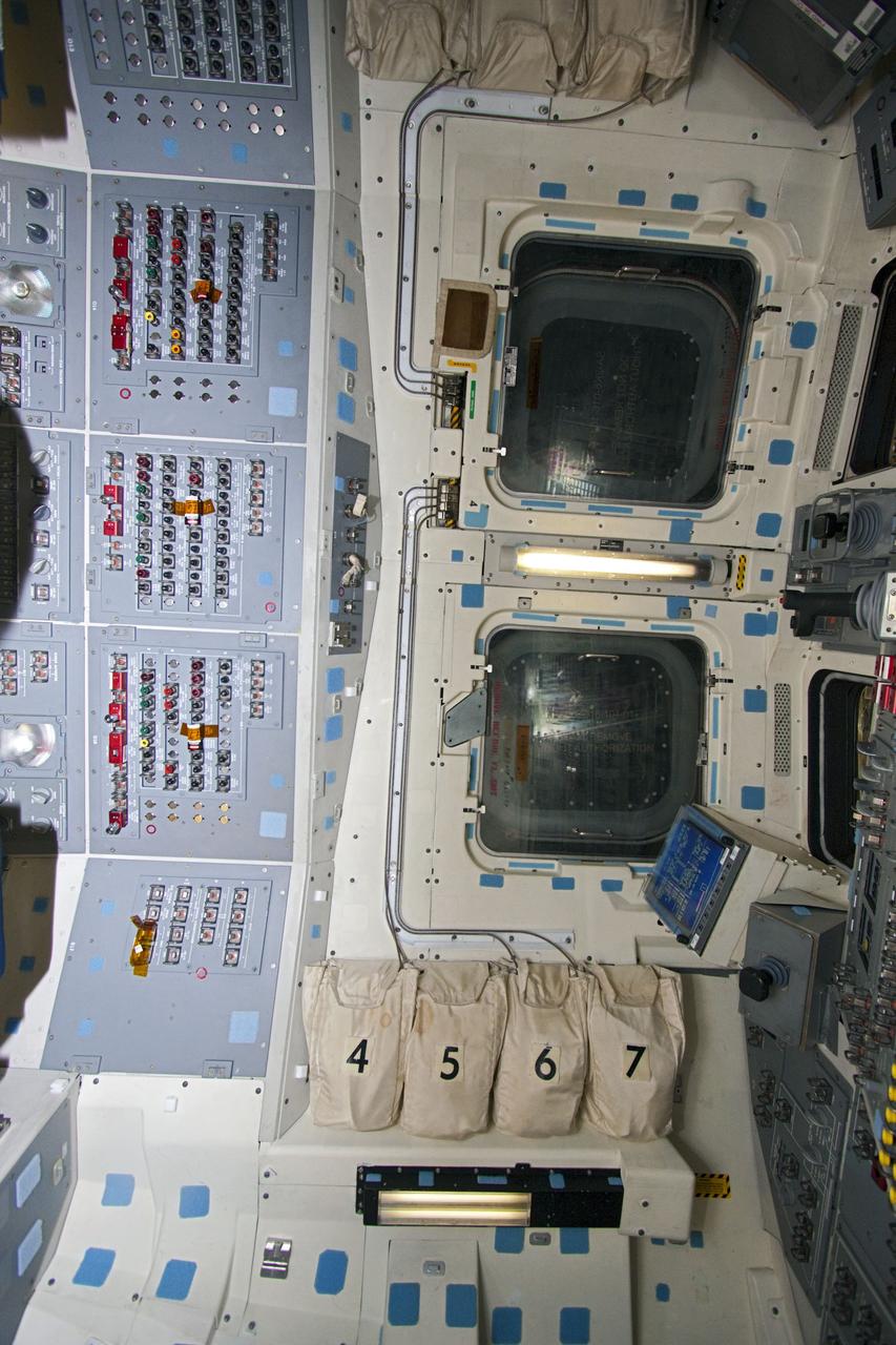 CAPE CANAVERAL, Fla. – In Orbiter Processing Facility-2 at NASA's Kennedy Space Center in Florida, the camera captures a section of space shuttle Atlantis' flight deck. Preparations are under way for the shuttle's final power down during Space Shuttle Program transition and retirement activities. Atlantis is being prepared for public display in 2013 at the Kennedy Space Center Visitor Complex.  For more information, visit http://www.nasa.gov/shuttle.  Photo credit: NASA/Jim Grossmann