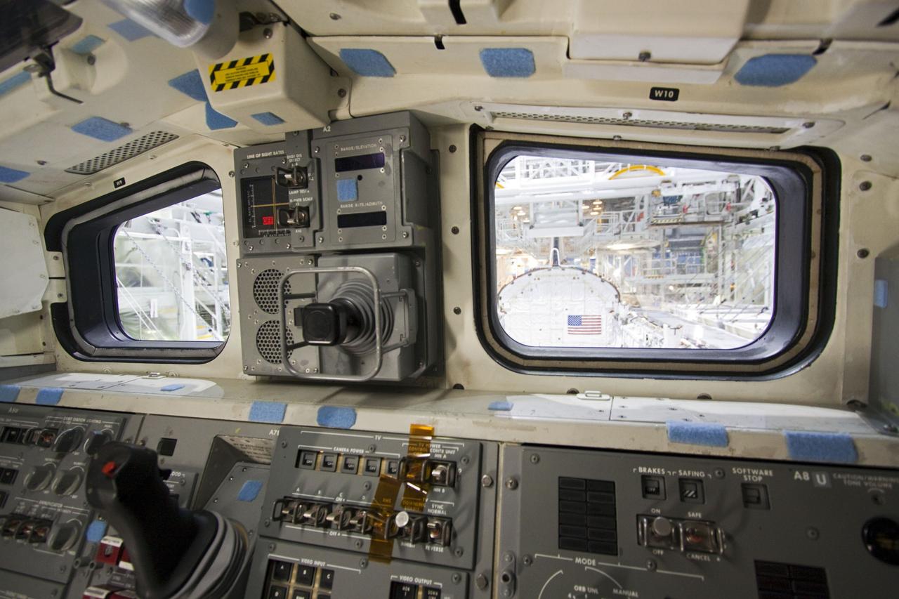 CAPE CANAVERAL, Fla. – In Orbiter Processing Facility-2 at NASA's Kennedy Space Center in Florida, a view of space shuttle Atlantis' payload bay is captured through the window of the flight deck. Preparations are under way for the shuttle's final power down during Space Shuttle Program transition and retirement activities. Atlantis is being prepared for public display in 2013 at the Kennedy Space Center Visitor Complex.  For more information, visit http://www.nasa.gov/shuttle.  Photo credit: NASA/Jim Grossmann