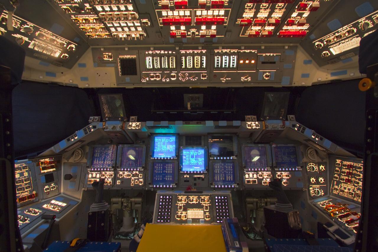 CAPE CANAVERAL, Fla. – In Orbiter Processing Facility-2 at NASA's Kennedy Space Center in Florida, the flight deck of space shuttle Atlantis is illuminated one last time during preparations to power down Atlantis during Space Shuttle Program transition and retirement activities. Atlantis is being prepared for public display in 2013 at the Kennedy Space Center Visitor Complex.  For more information, visit http://www.nasa.gov/shuttle.  Photo credit: NASA/Jim Grossmann