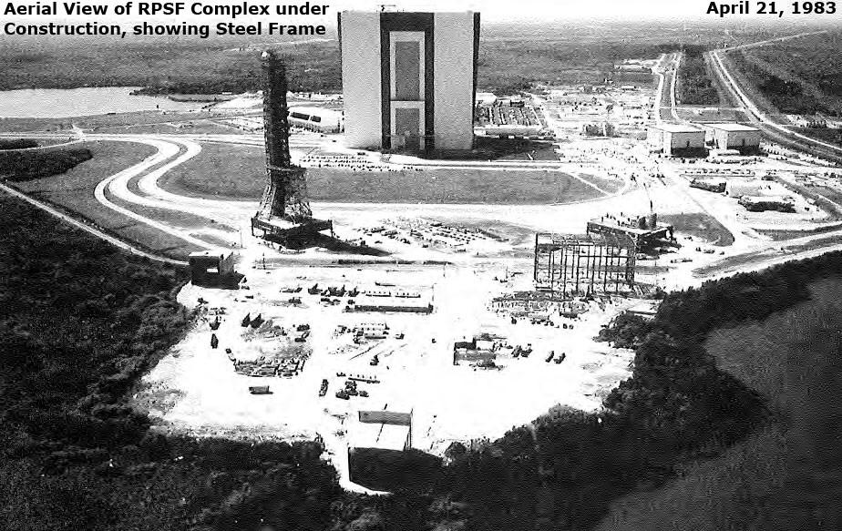 Aerial View of RPSF Complex under construction showing steel frame, April 21, 1983