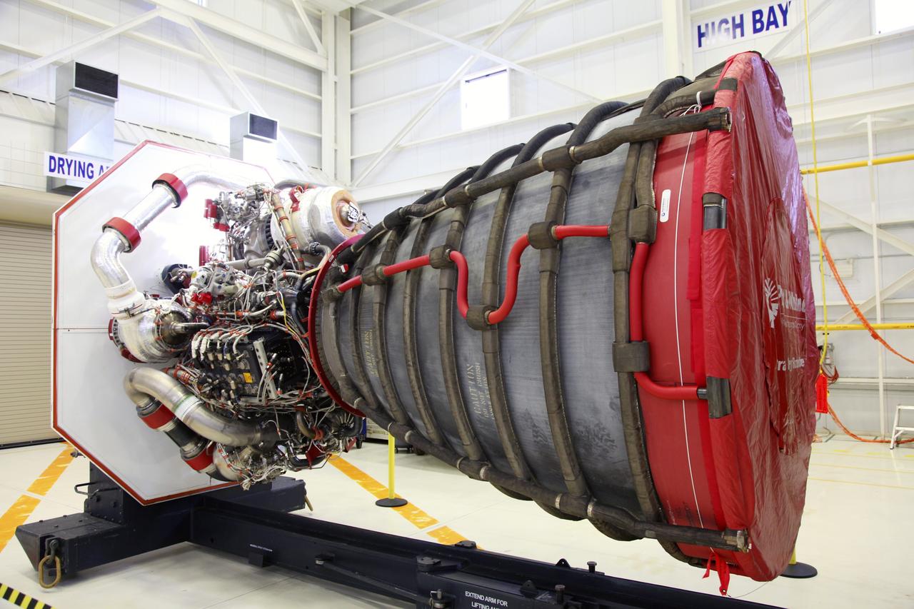 CAPE CANAVERAL, Fla. – In the Space Shuttle Main Engine Processing Facility at NASA’s Kennedy Space Center in Florida, preparations are under way to install a Pratt Whitney Rocketdyne space shuttle main engine (SSME) into a transportation canister.    This is the second of the 15 engines used during the Space Shuttle Program to be prepared for transfer to NASA's Stennis Space Center in Mississippi. The engines will be stored at Stennis for future use on NASA's new heavy-lift rocket, the Space Launch System (SLS), which will carry NASA's new Orion spacecraft, cargo, equipment and science experiments to space.  For more information, visit http://www.nasa.gov/shuttle.  Photo credit: NASA/Gianni Woods