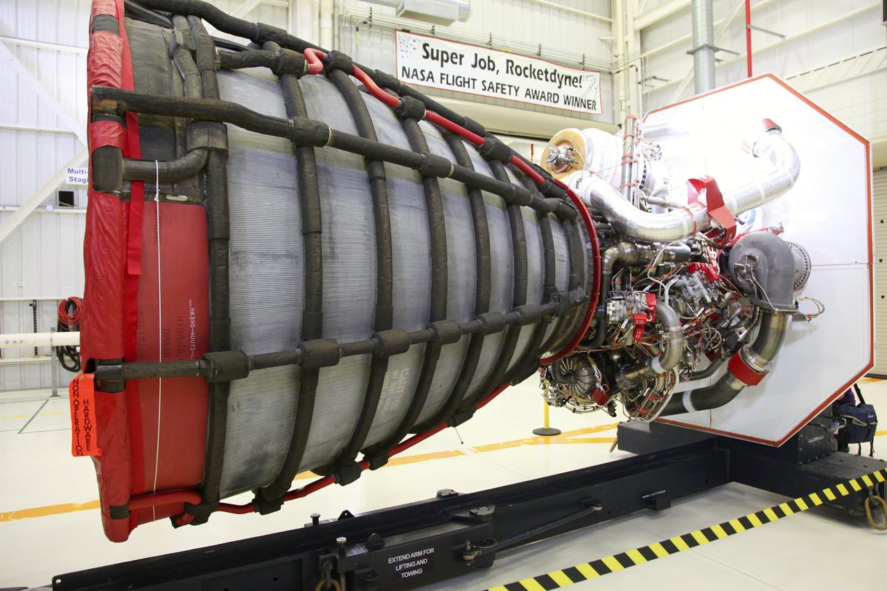 CAPE CANAVERAL, Fla. – In the Space Shuttle Main Engine Processing Facility at NASA’s Kennedy Space Center in Florida, a Pratt Whitney Rocketdyne space shuttle main engine (SSME) is ready for installation in a transportation canister. This is the second of the 15 engines used during the Space Shuttle Program to be prepared for transfer to NASA's Stennis Space Center in Mississippi. The engines will be stored at Stennis for future use on NASA's new heavy-lift rocket, the Space Launch System (SLS), which will carry NASA's new Orion spacecraft, cargo, equipment and science experiments to space. For more information, visit http://www.nasa.gov/shuttle. Photo credit: NASA/Gianni Woods