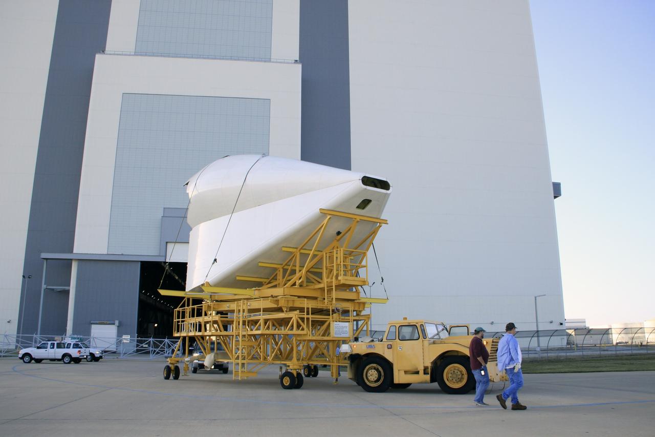 CAPE CANAVERAL, Fla. -- The tail cone for space shuttle Discovery’s three replica shuttle main engines (RSMEs) is being transported from the Vehicle Assembly Building to Orbiter Processing Facility-1 at NASA’s Kennedy Space Center in Florida. The tail cone will be installed around Discovery’s RSMEs for protection.    The work is part of the Space Shuttle Program’s transition and retirement processing of shuttle Discovery. Discovery is being prepared for display at the Smithsonian’s National Air and Space Museum, Steven F. Udvar-Hazy Center in Chantilly, Va. For more information, visit http://www.nasa.gov/shuttle.  Photo credit: NASA/Jim Grossmann