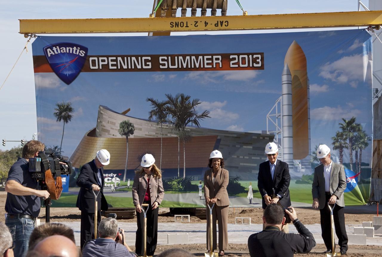CAPE CANAVERAL, Fla. – During a ceremony in the Shuttle Plaza area at the Kennedy Space Center Visitor Complex in Florida, state and local dignitaries break ground for the future home of space shuttle Atlantis. From left, are KSCVC Chief Operating Officer Bill Moore; Kennedy Space Center Deputy Director Janet Petro; Lt. Governor of Florida Jennifer Carroll; Jeremy Jacobs, chairman and chief executive officer of Delaware North Companies; and STS-135 Commander Chris Ferguson.    Delaware North Parks & Resorts, in partnership with NASA’s Kennedy Space Center, broke ground for the 65,000 square-foot exhibit that will house Atlantis at the visitor complex. For more information, visit www.KennedySpaceCenter.com.  Photo credit: NASA/Jim Grossmann