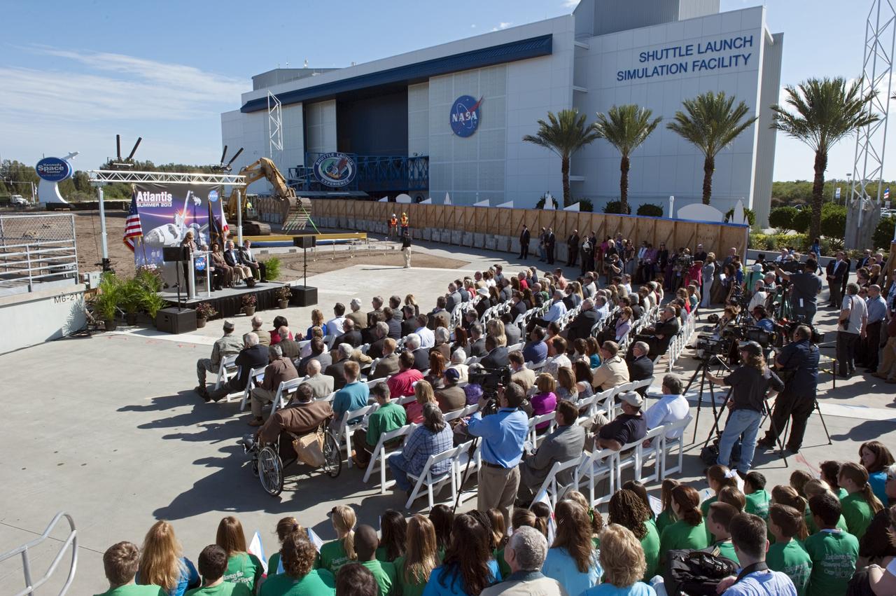 CAPE CANAVERAL, Fla. – In the Shuttle Plaza area at the Kennedy Space Center Visitor Complex in Florida, state and local dignitaries speak during the Ground Breaking Ceremony for the future home of space shuttle Atlantis.     Delaware North Parks & Resorts, in partnership with NASA’s Kennedy Space Center, broke ground for the 65,000 square-foot exhibit that will house Atlantis at the visitor complex. For more information, visit www.KennedySpaceCenter.com.  Photo credit: NASA/Kim Shiflett