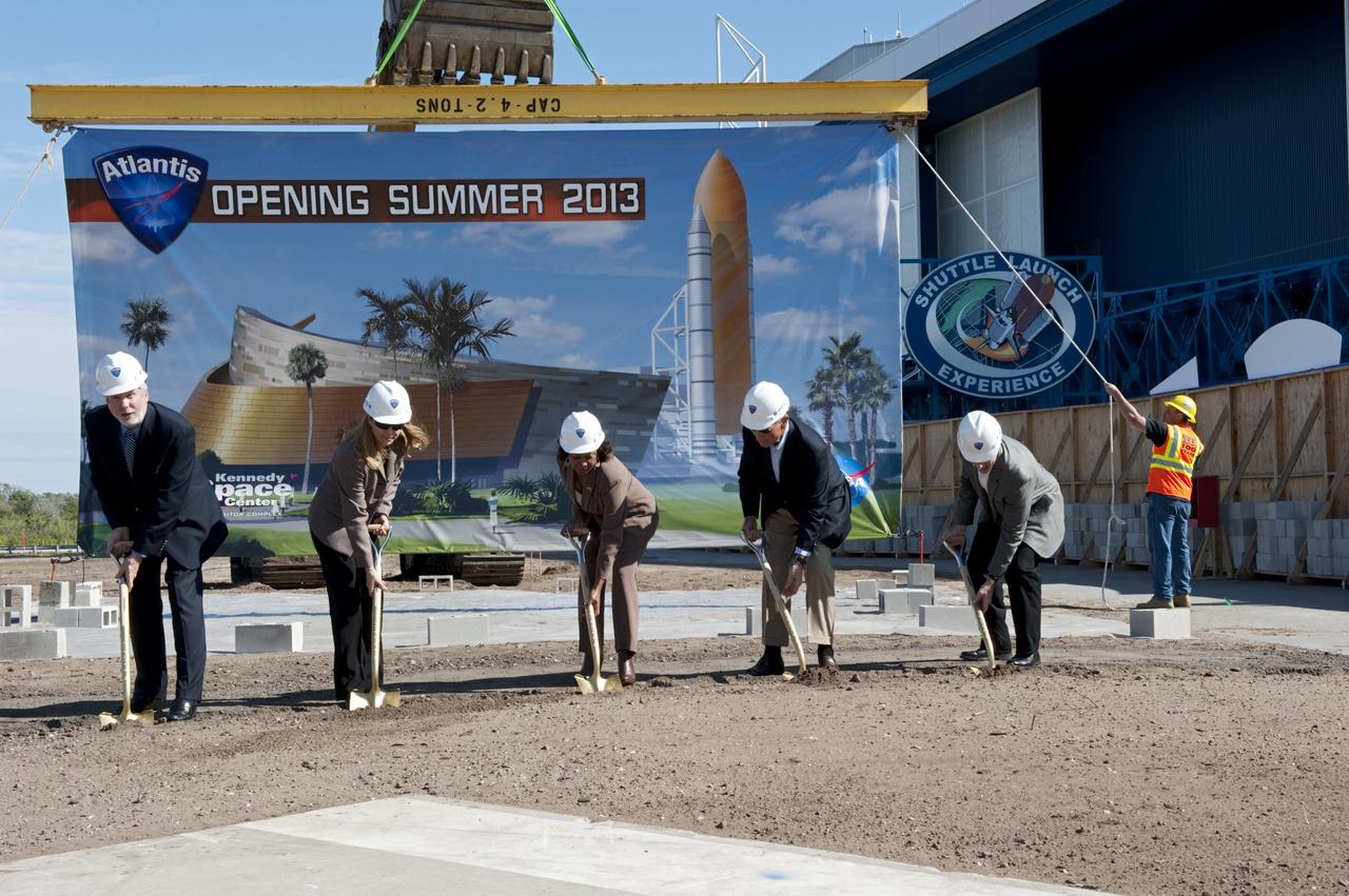 CAPE CANAVERAL, Fla. – In the Shuttle Plaza area at the Kennedy Space Center Visitor Complex (KSCVC) in Florida, state and local dignitaries participate in a Ground Breaking Ceremony for the future home of space shuttle Atlantis. From left, are KSCVC Chief Operating Officer Bill Moore; Kennedy Space Center Deputy Director Janet Petro; Lt. Governor of Florida Jennifer Carroll; Jeremy Jacobs, chairman and chief executive officer of Delaware North Companies; and STS-135 Commander Chris Ferguson.    Delaware North Parks & Resorts, in partnership with NASA’s Kennedy Space Center, broke ground for the 65,000 square-foot exhibit that will house Atlantis at the visitor complex. For more information, visit www.KennedySpaceCenter.com.  Photo credit: NASA/Kim Shiflett