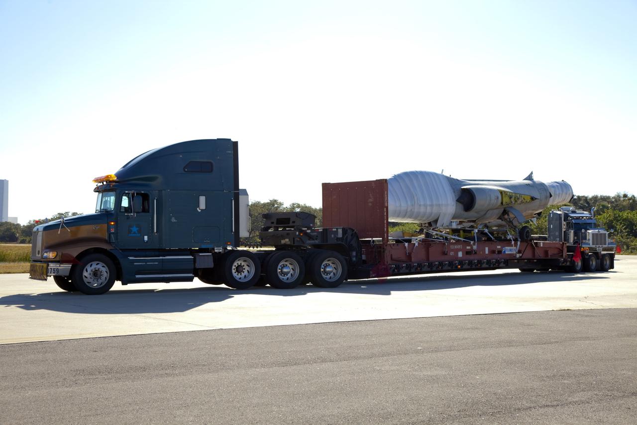 CAPE CANAVERAL, Fla. -- A truck delivers an F-104 Starfighter, formerly of the Italian Air Force, to Starfighters Inc. at NASA's Kennedy Space Center in Florida on Jan. 19, 2012. The aircraft is one of five delivered to the company recently. They will be reassembled to fly research and development and other missions. Starfighters operates out of a hangar at the Shuttle Landing Facility at Kennedy under an agreement with Kennedy. Photo credit: NASA/Frankie Martin