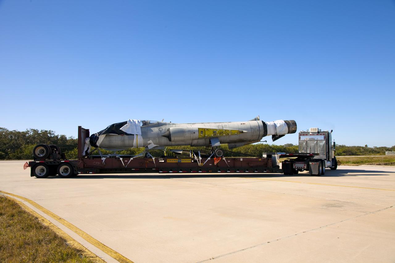 CAPE CANAVERAL, Fla. -- A truck delivers an F-104 Starfighter, formerly of the Italian Air Force, to Starfighters Inc. at NASA's Kennedy Space Center in Florida on Jan. 19, 2012. The aircraft is one of five delivered to the company recently. They will be reassembled to fly research and development and other missions. Starfighters operates out of a hangar at the Shuttle Landing Facility at Kennedy under an agreement with Kennedy. Photo credit: NASA/Frankie Martin