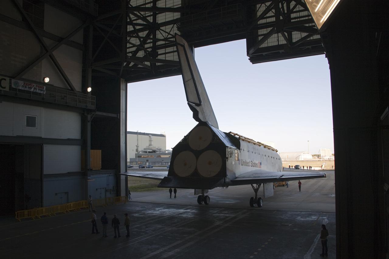CAPE CANAVERAL, Fla. -- Space shuttle Atlantis arrives in the transfer aisle of the Vehicle Assembly Building (VAB) at NASA's Kennedy Space Center in Florida on its move from Orbiter Processing Facility-2. Atlantis will be stored temporarily in the VAB while transition and retirement processing resumes on shuttle Endeavour in the processing hangar. Endeavour is being prepared for public display at the California Science Center in Los Angeles. A groundbreaking was held Jan. 18 for Atlantis' future home -- a 65,000-square-foot exhibit in Shuttle Plaza at the Kennedy Space Center Visitor Complex. For additional information, visit http://www.nasa.gov/shuttle. Photo credit: NASA/Jim Grossmann