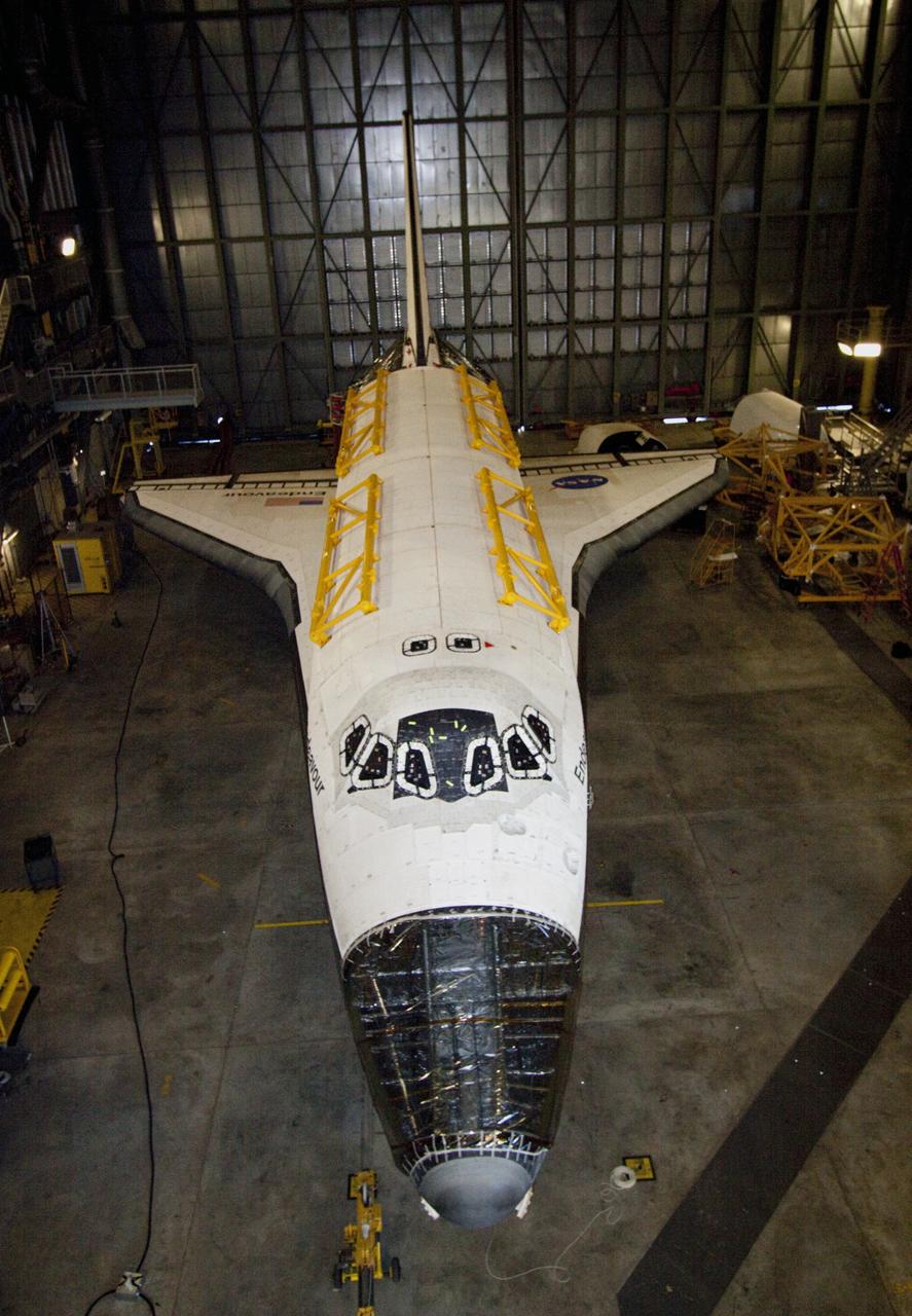 CAPE CANAVERAL, Fla. -- At NASA's Kennedy Space Center in Florida, space shuttle Endeavour awaits transfer from the Vehicle Assembly Building (VAB), where it is being stored, to Orbiter Processing Facility-2. Transition and retirement processing then will resume on Endeavour for its public display at the California Science Center in Los Angeles. For additional information, visit http://www.nasa.gov/shuttle. Photo credit: NASA/Jim Grossmann