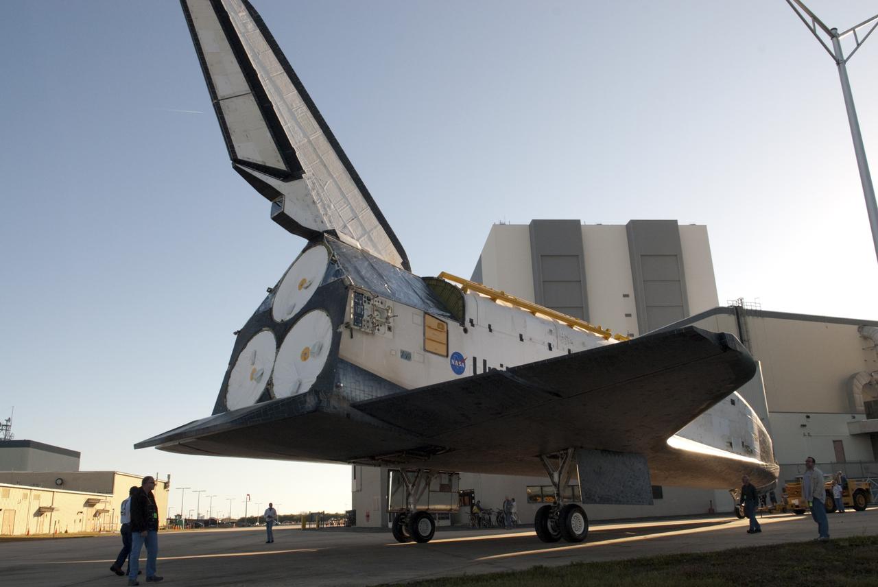CAPE CANAVERAL, Fla. -- Space shuttle Atlantis executes a three-point turnaround outside Orbiter Processing Facility-2 on its move to the Vehicle Assembly Building (VAB) at NASA's Kennedy Space Center in Florida. In the background is the 525-foot-tall VAB. Atlantis will be stored temporarily in the VAB while transition and retirement processing resumes on shuttle Endeavour in the processing hangar. Endeavour is being prepared for public display at the California Science Center in Los Angeles. A groundbreaking was held Jan. 18 for Atlantis' future home -- a 65,000-square-foot exhibit in Shuttle Plaza at the Kennedy Space Center Visitor Complex. For additional information, visit http://www.nasa.gov/shuttle. Photo credit: NASA/Charisse Nahser
