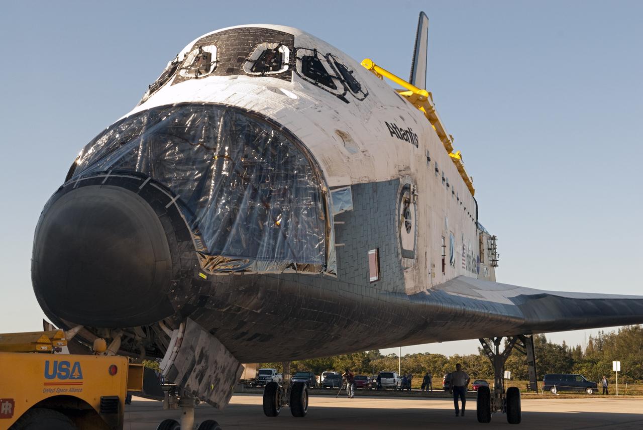 CAPE CANAVERAL, Fla. -- Protective plastic flanks the nose of space shuttle Atlantis for its move from Orbiter Processing Facility-2 to the Vehicle Assembly Building (VAB) at NASA's Kennedy Space Center in Florida. Atlantis will be stored temporarily in the VAB while transition and retirement processing resumes on shuttle Endeavour in the processing hangar. Endeavour is being prepared for public display at the California Science Center in Los Angeles. A groundbreaking was held Jan. 18 for Atlantis' future home -- a 65,000-square-foot exhibit in Shuttle Plaza at the Kennedy Space Center Visitor Complex. For additional information, visit http://www.nasa.gov/shuttle. Photo credit: NASA/Charisse Nahser