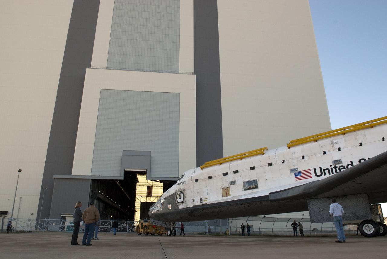 CAPE CANAVERAL, Fla. -- Space shuttle Atlantis arrives at the 525-foot-tall Vehicle Assembly Building (VAB) at NASA's Kennedy Space Center in Florida on its move from Orbiter Processing Facility-2. Atlantis will be stored temporarily in the VAB while transition and retirement processing resumes on shuttle Endeavour in the processing hangar. Endeavour is being prepared for public display at the California Science Center in Los Angeles. A groundbreaking was held Jan. 18 for Atlantis' future home -- a 65,000-square-foot exhibit in Shuttle Plaza at the Kennedy Space Center Visitor Complex. For additional information, visit http://www.nasa.gov/shuttle. Photo credit: NASA/Charisse Nahser